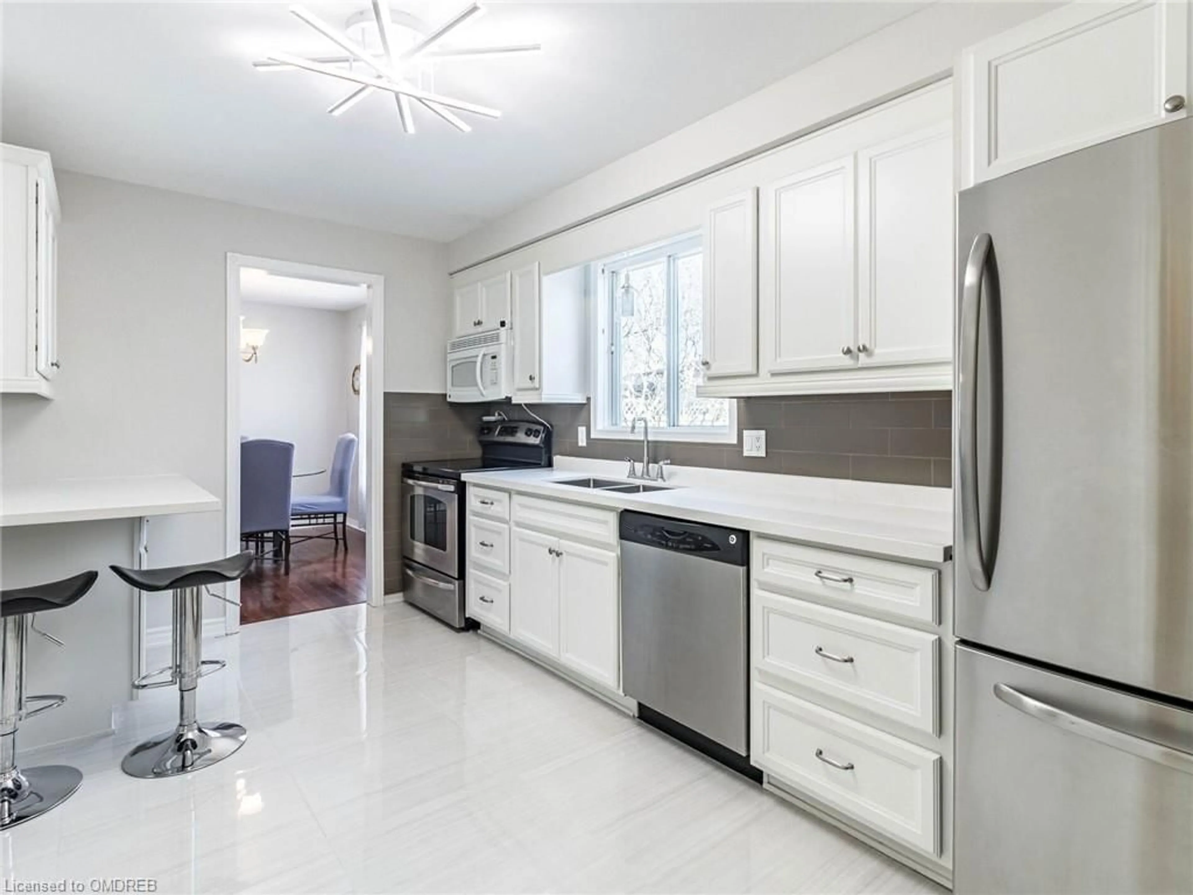 Open concept kitchen for 24 The Meadows St, St. Catharines Ontario L2N 7L1