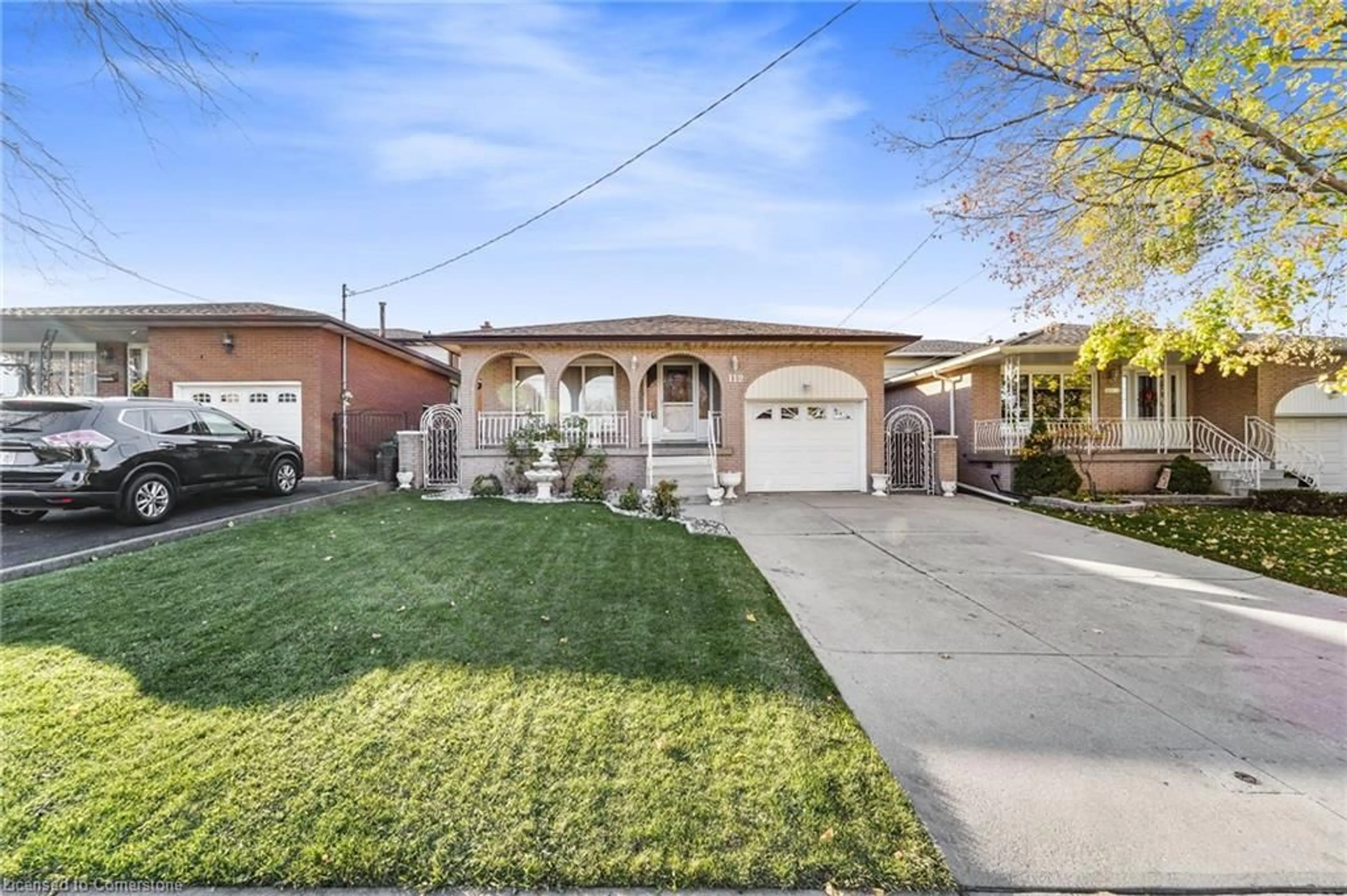 Frontside or backside of a home, the fenced backyard for 112 Ravenbury Dr, Hamilton Ontario L8W 2B5