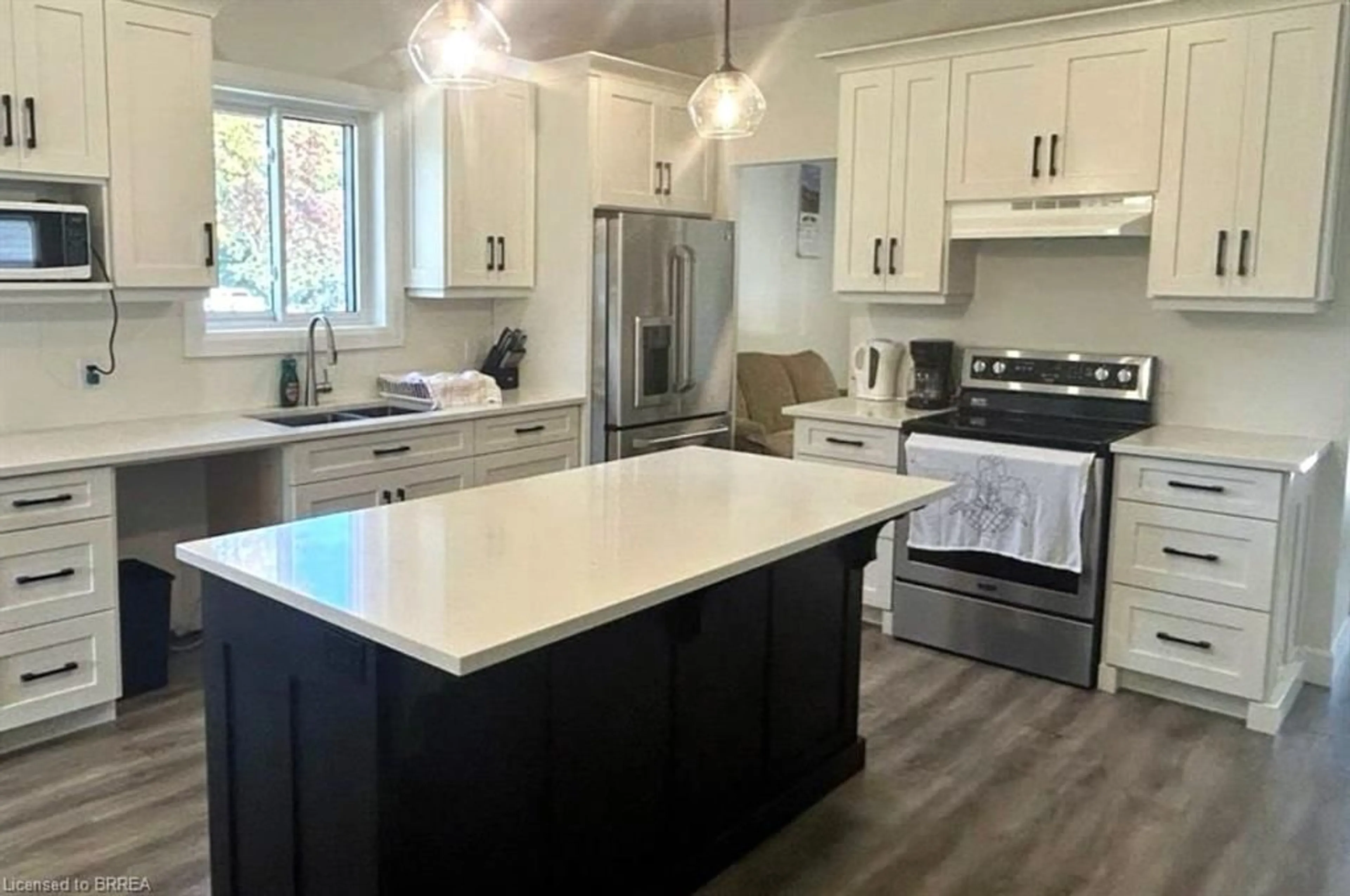 Open concept kitchen for 165 Gordon St, Bothwell Ontario N0P 1C0