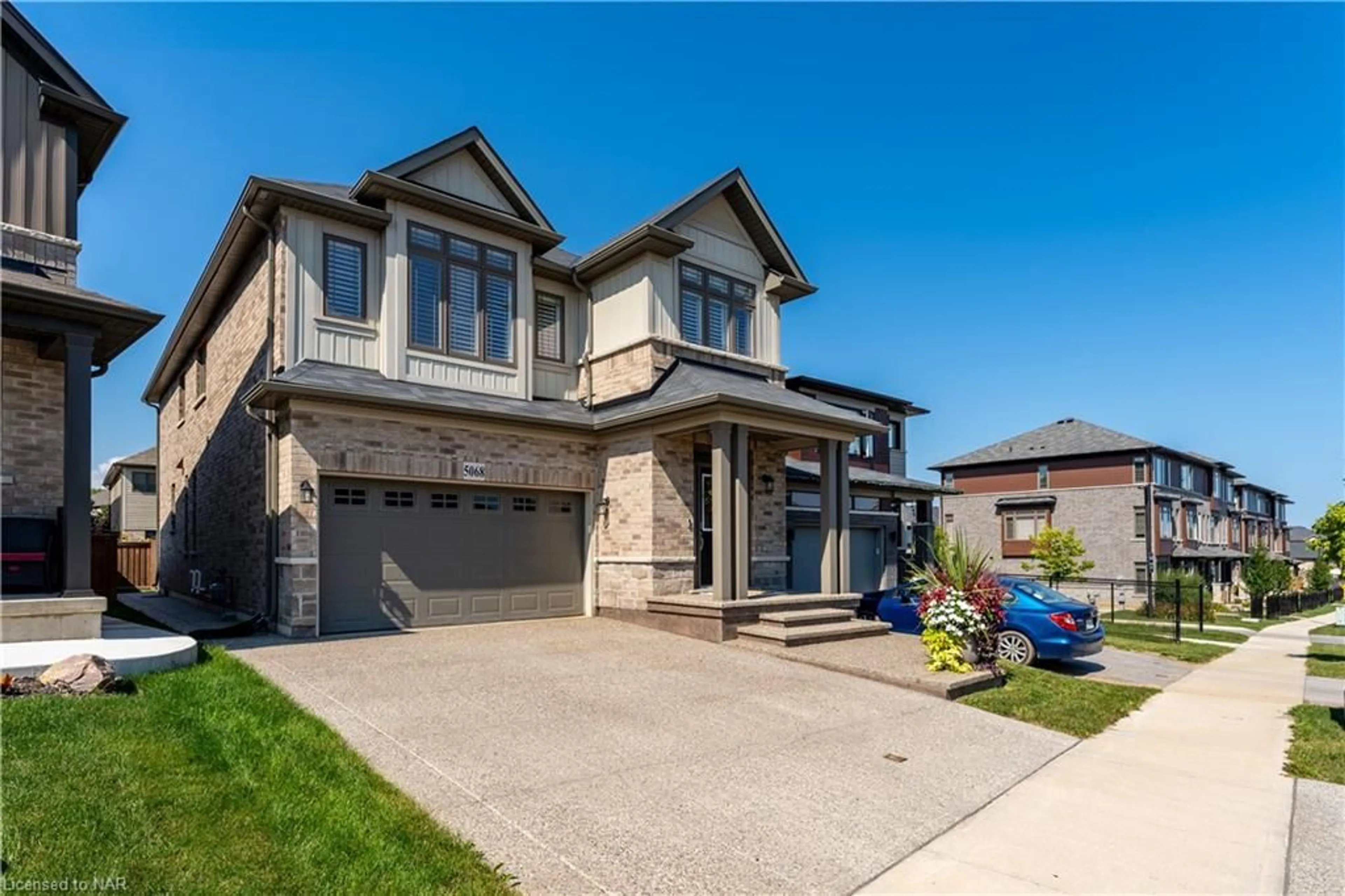 Frontside or backside of a home, the street view for 5068 Connor Dr, Beamsville Ontario L0R 1B7