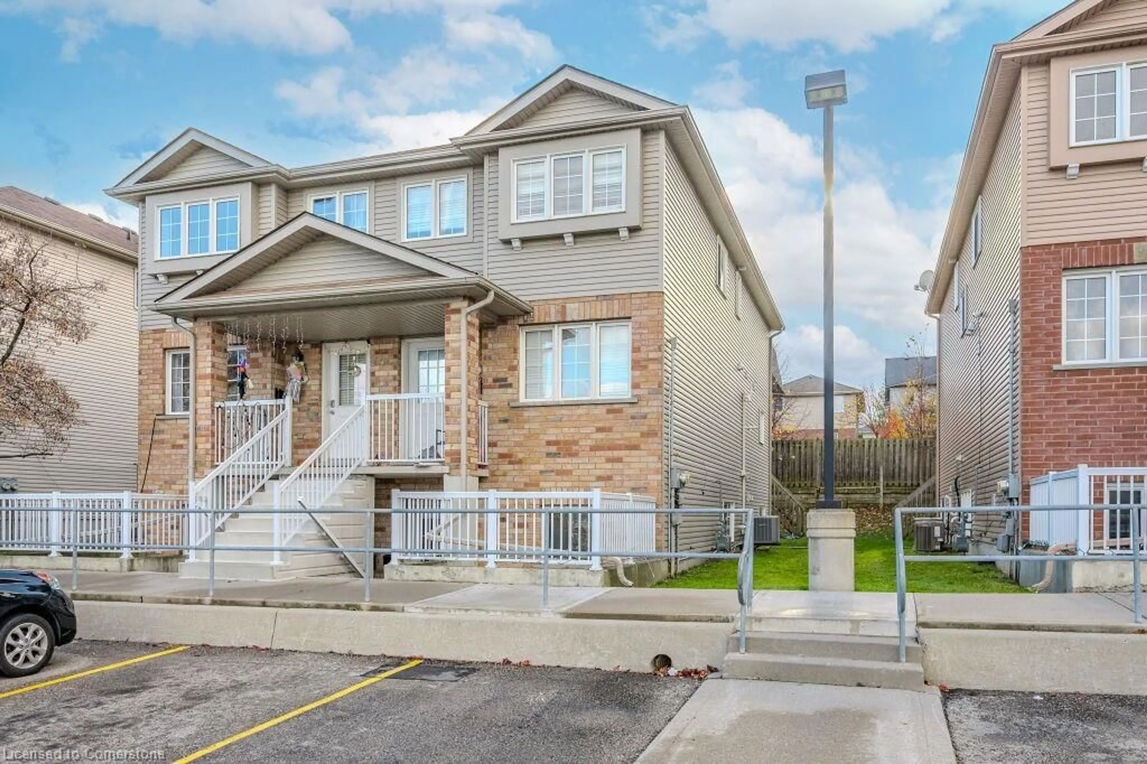 A pic from exterior of the house or condo, the street view for 50 Howe Dr #3D, Kitchener Ontario N2E 0A3