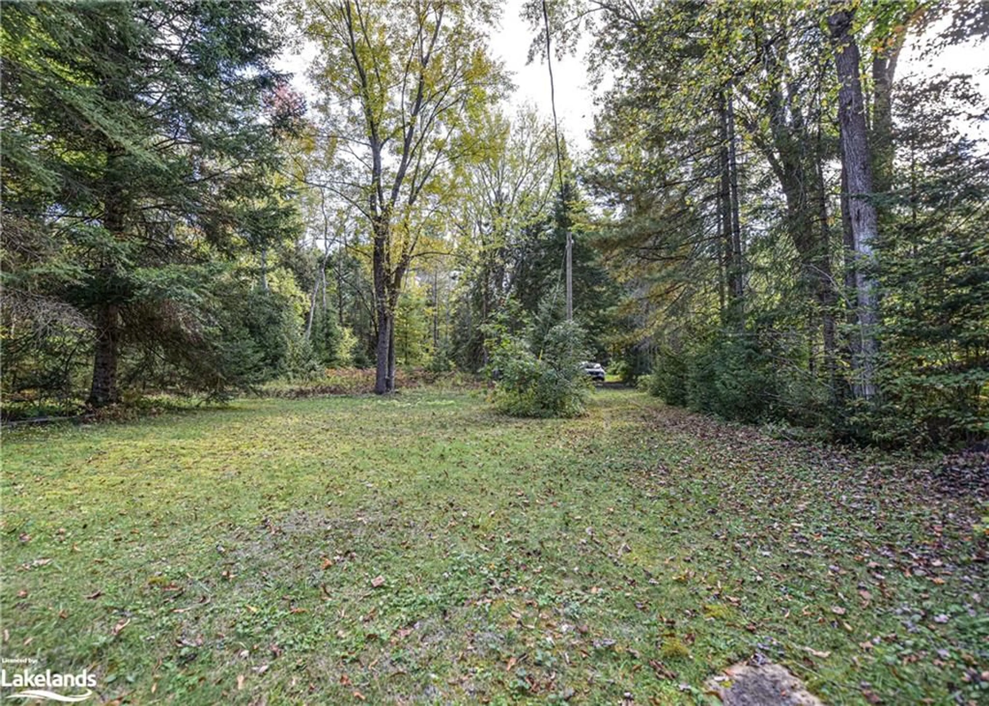 Patio, the fenced backyard for 6571 Pioneer Village Lane, Sebright Ontario L0K 1W0