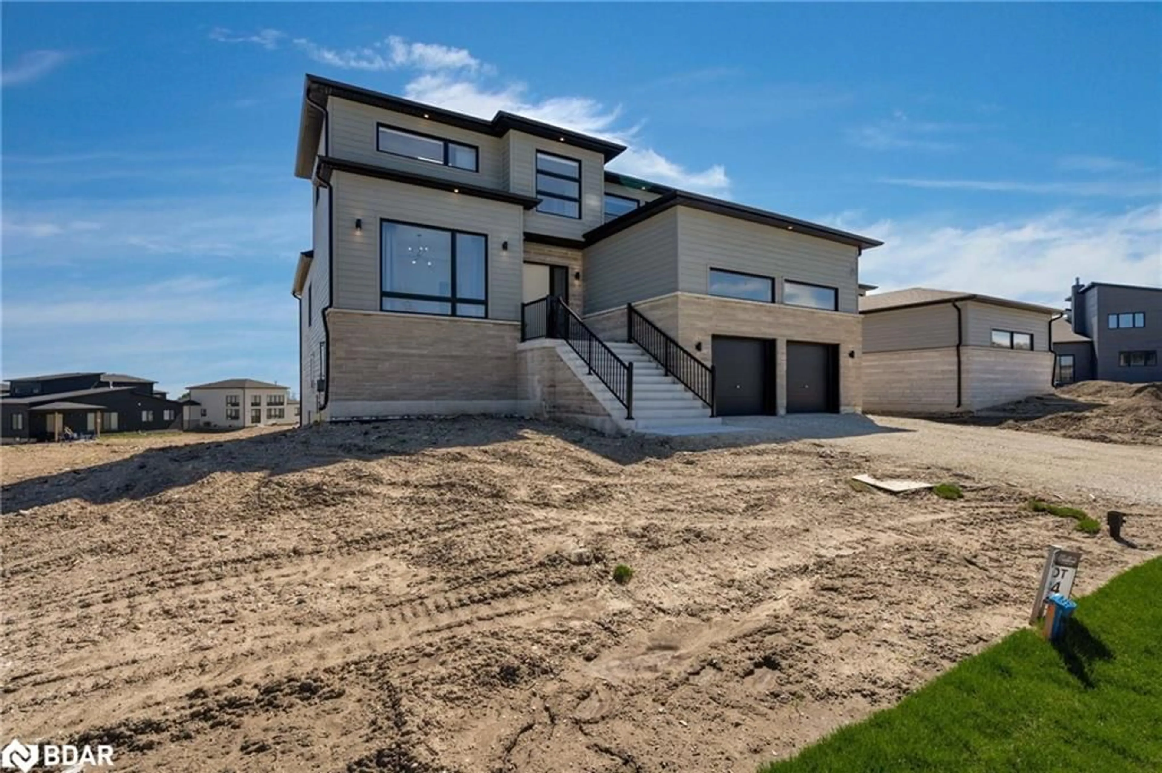 Frontside or backside of a home, the fenced backyard for 114 Sladden Court, Thornbury Ontario N0H 2P0