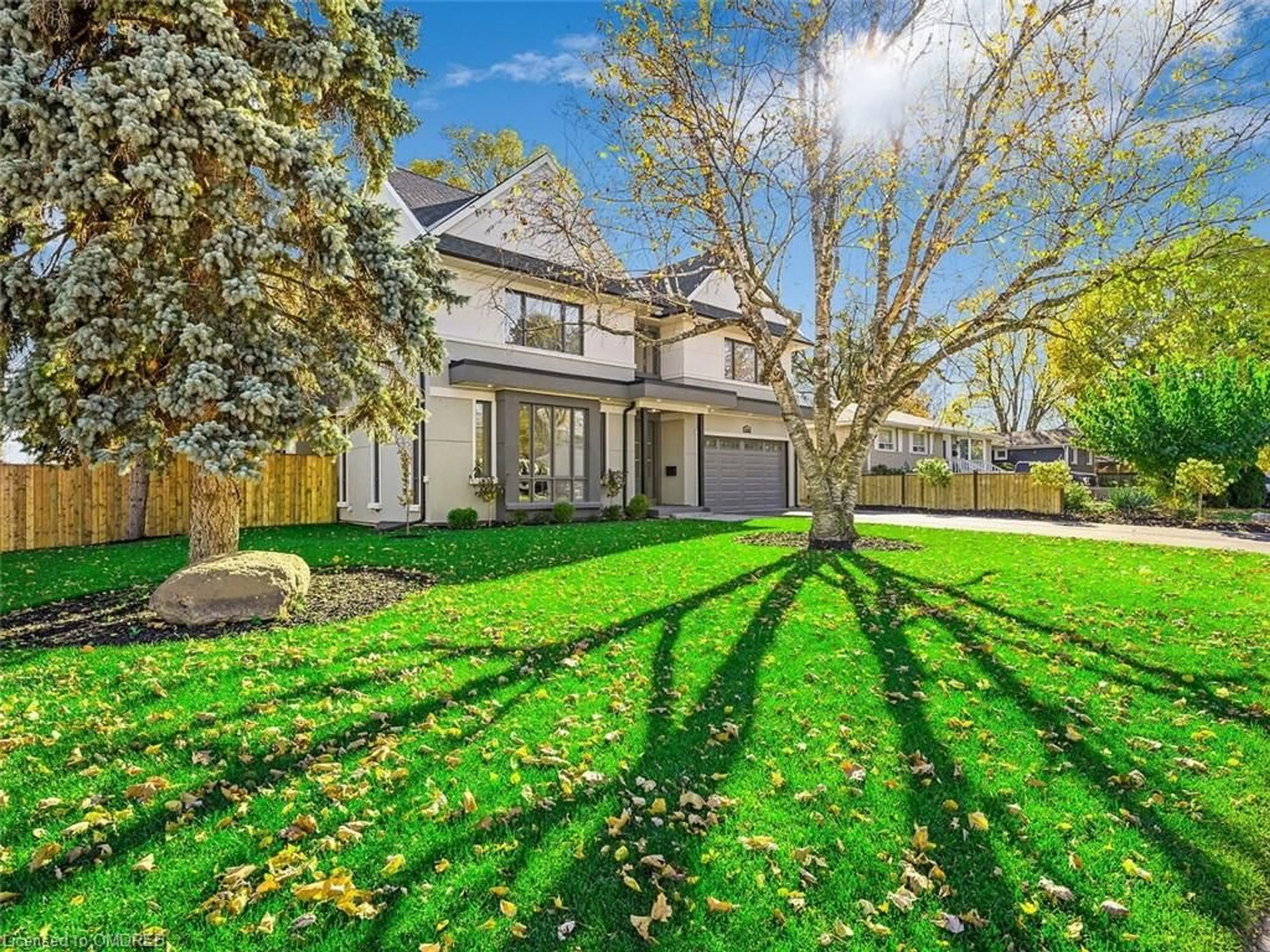 A pic from exterior of the house or condo, the fenced backyard for 5538 Eaton Ave, Burlington Ontario L7L 4W6