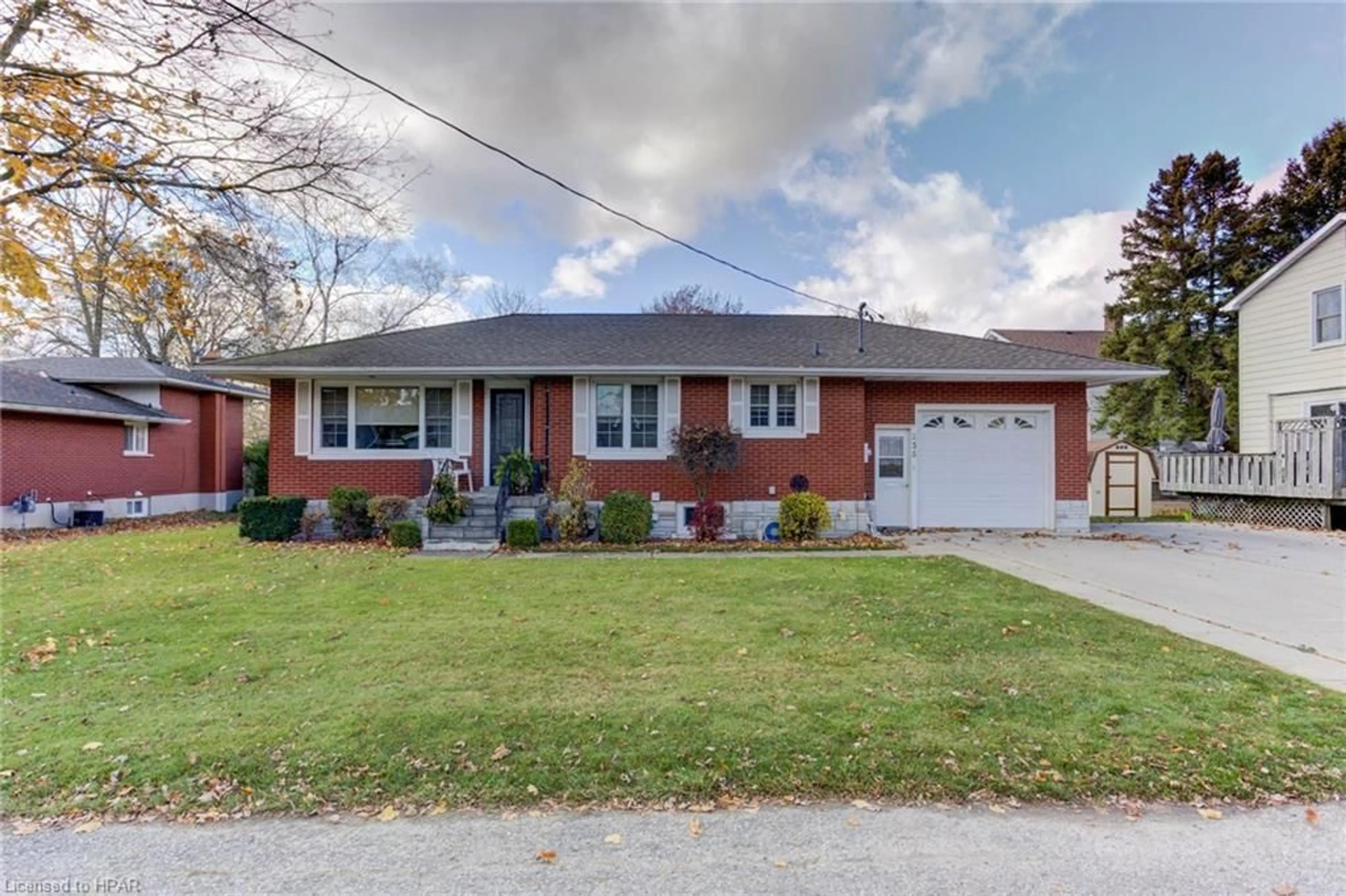 Home with brick exterior material for 235 Lillico Ave, Listowel Ontario N4W 2L6