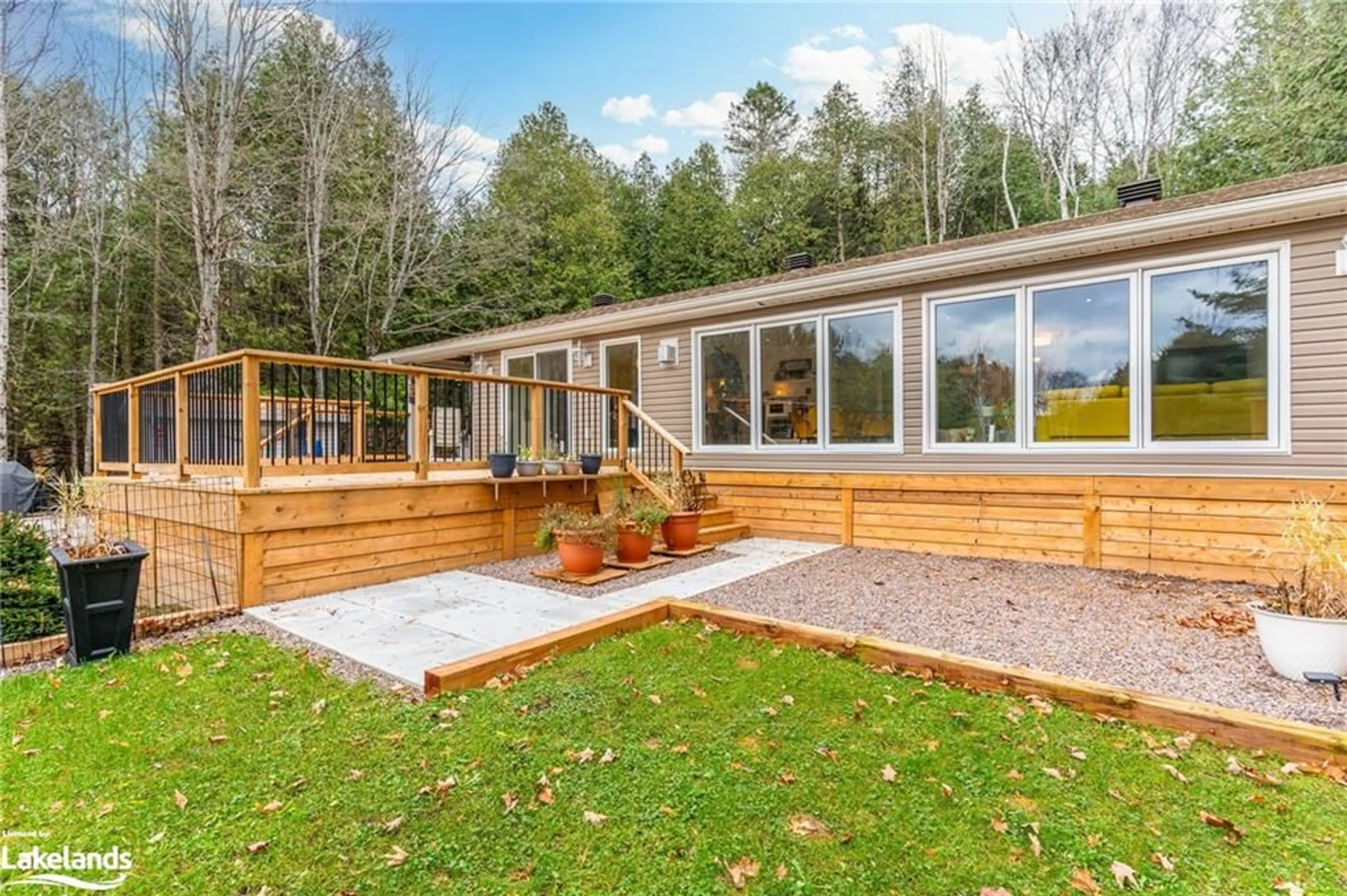 Home with vinyl exterior material for 1086 Providence Dr, Algonquin Highlands Ontario K0M 1S0