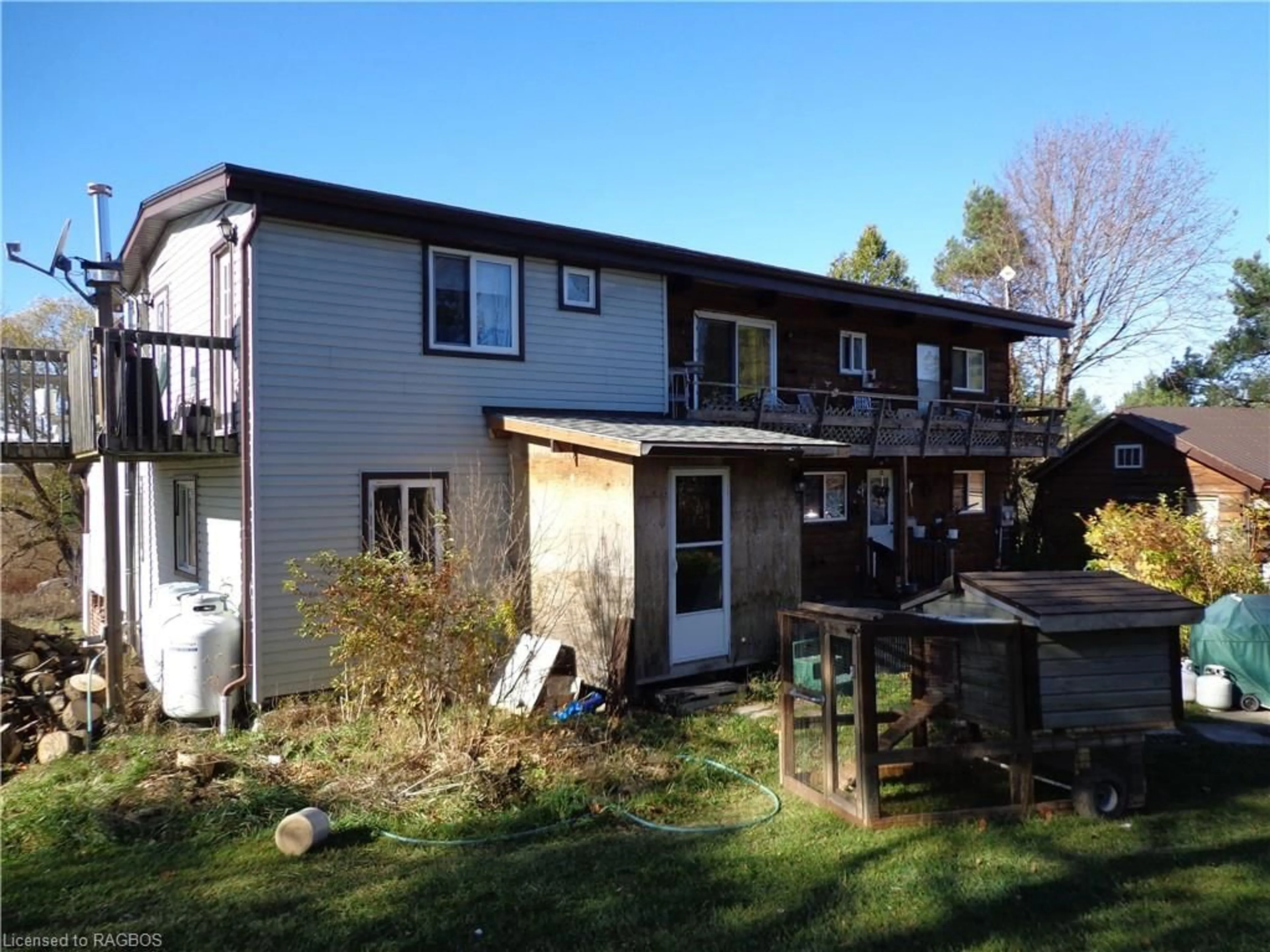 Frontside or backside of a home, the fenced backyard for 207 Concession Road 2, Saugeen Twp Ontario N0G 2N0