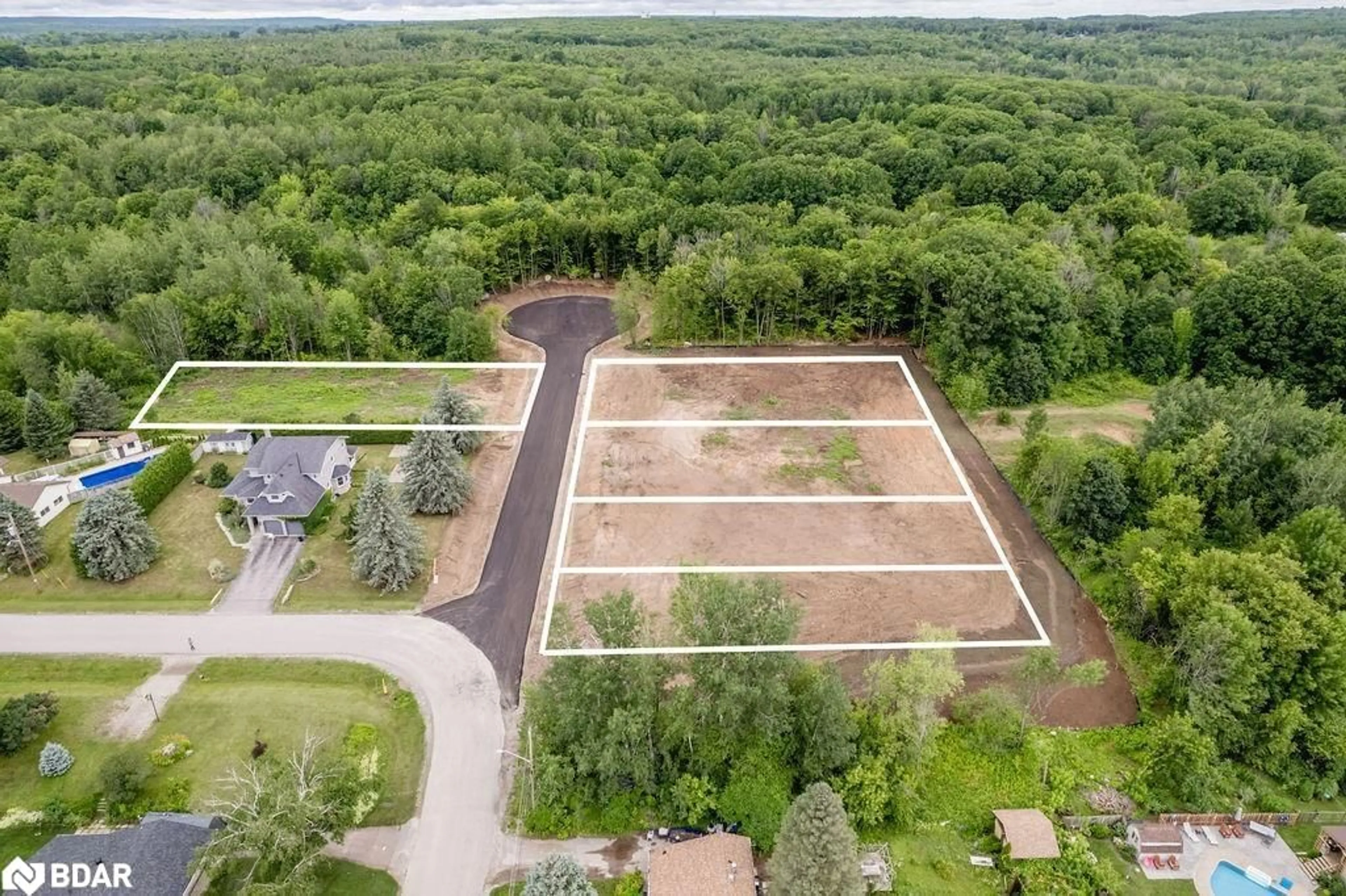 A pic from exterior of the house or condo, the fenced backyard for 293 Centennial Drive Dr, Midland Ontario L4R 5H9