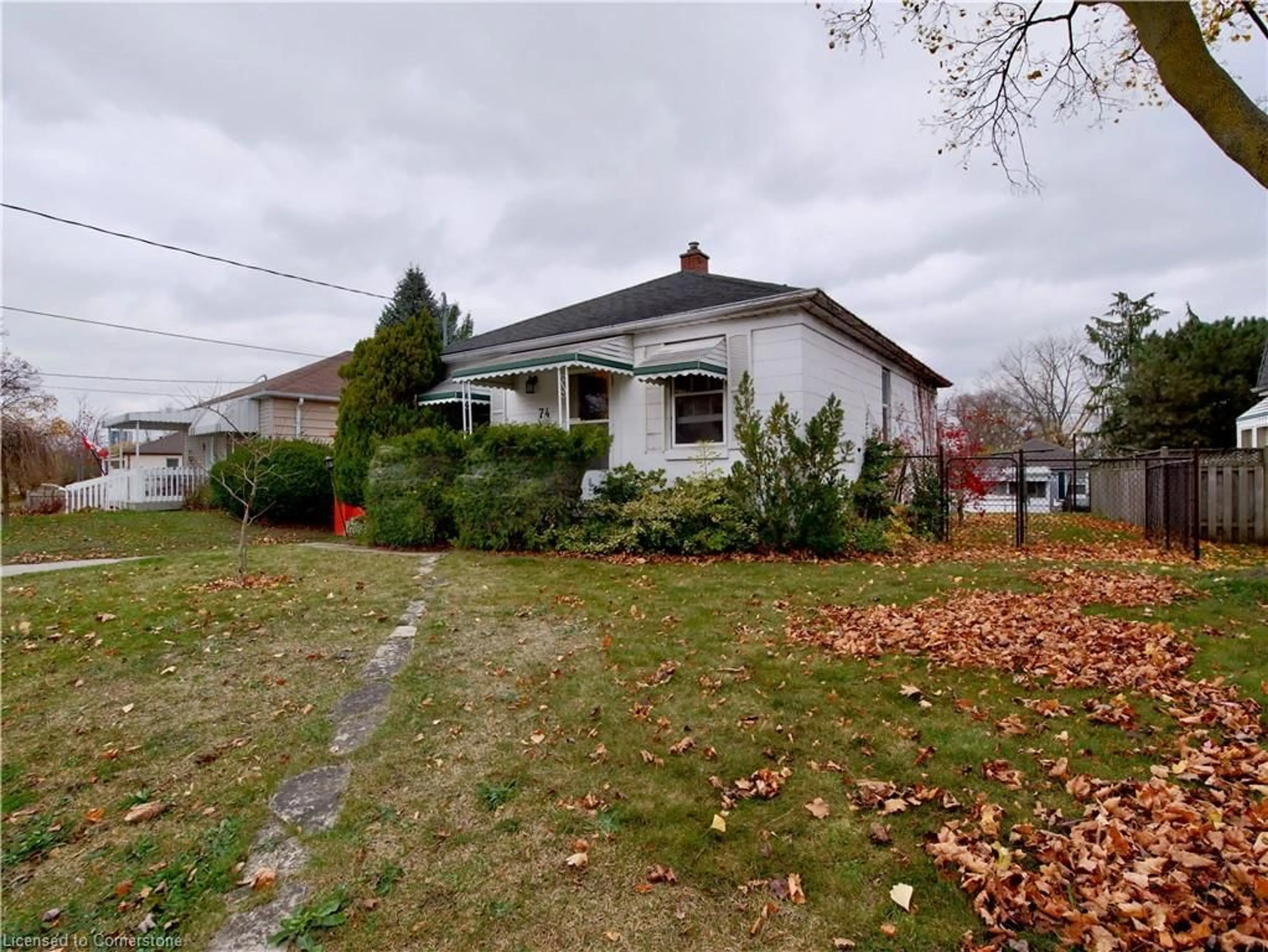 Frontside or backside of a home, the street view for 74 St Clair Ave, Kitchener Ontario N2M 3Z4