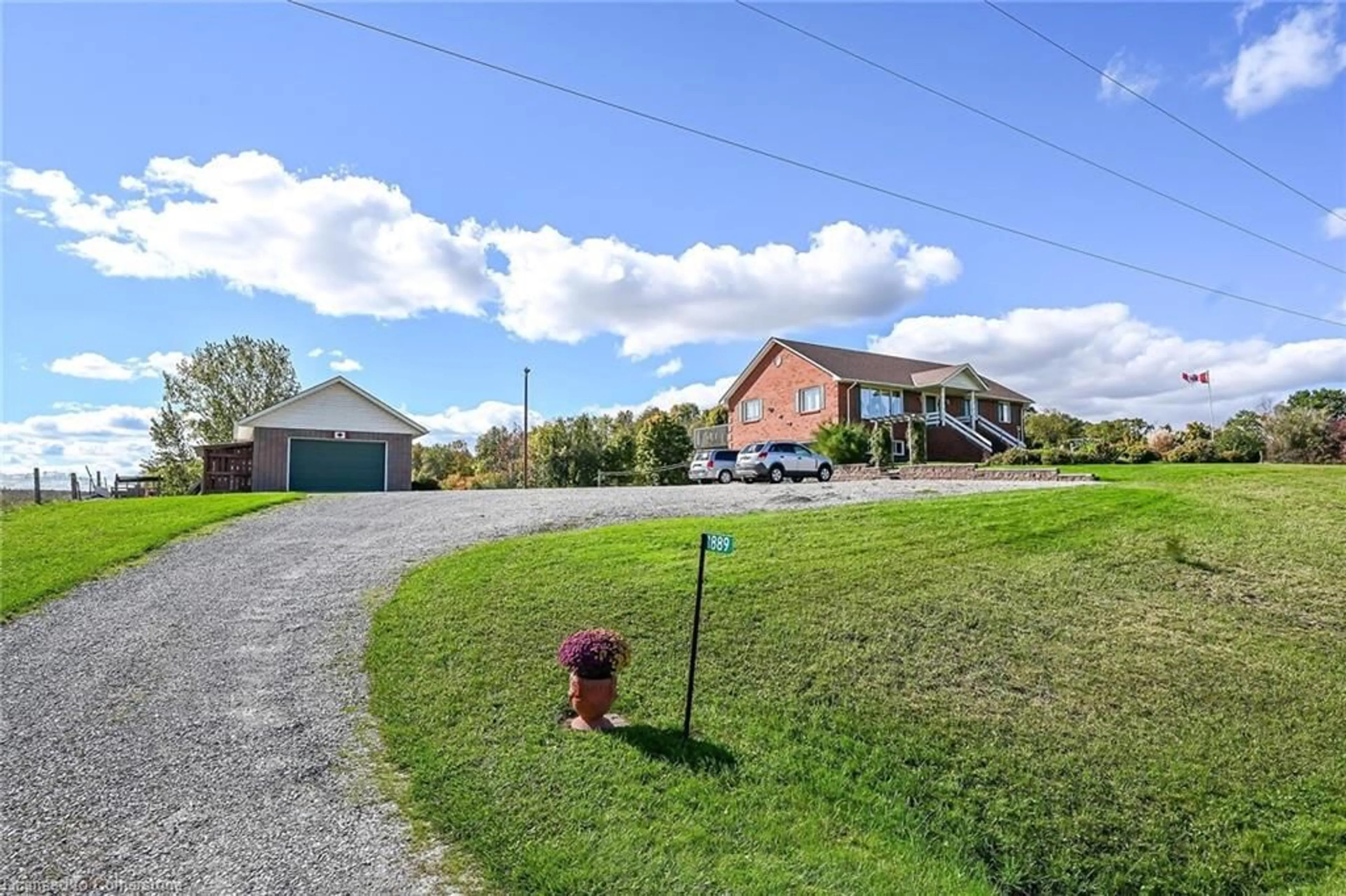 A pic from exterior of the house or condo, the fenced backyard for 1889 Haldimand Road 17, Cayuga Ontario N0A 1E0