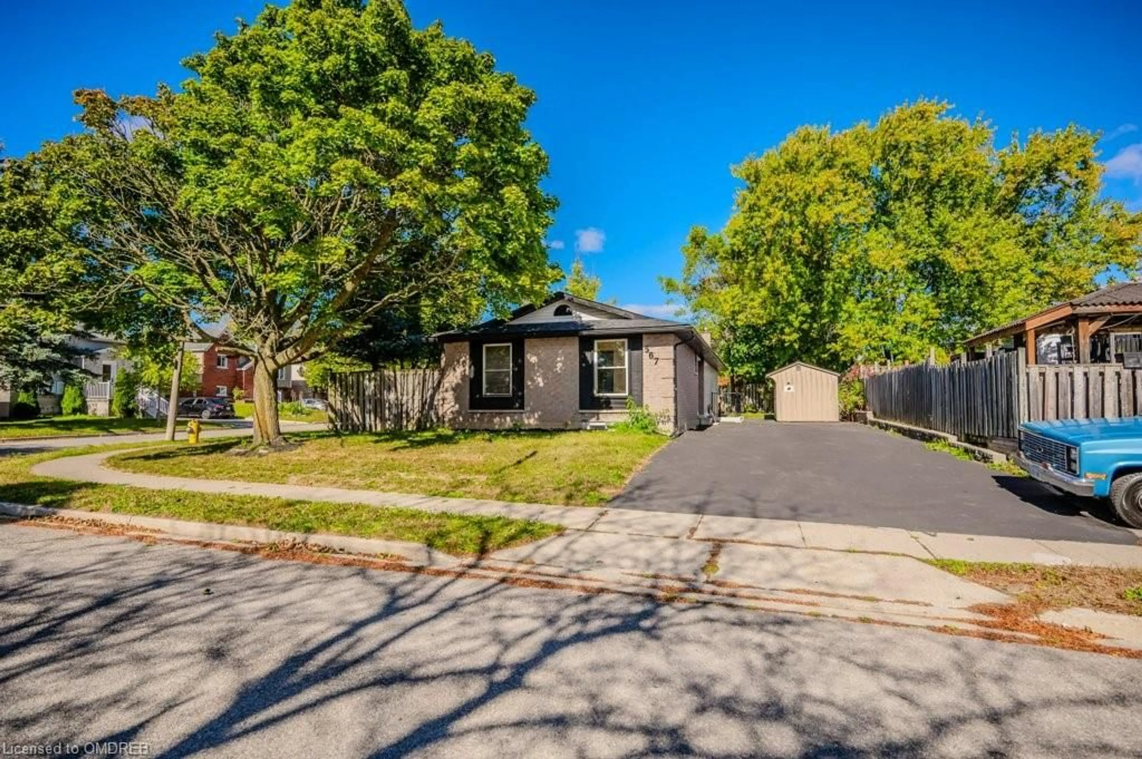 A pic from exterior of the house or condo, the fenced backyard for 567 Halberstadt Cir, Cambridge Ontario N3H 5J5