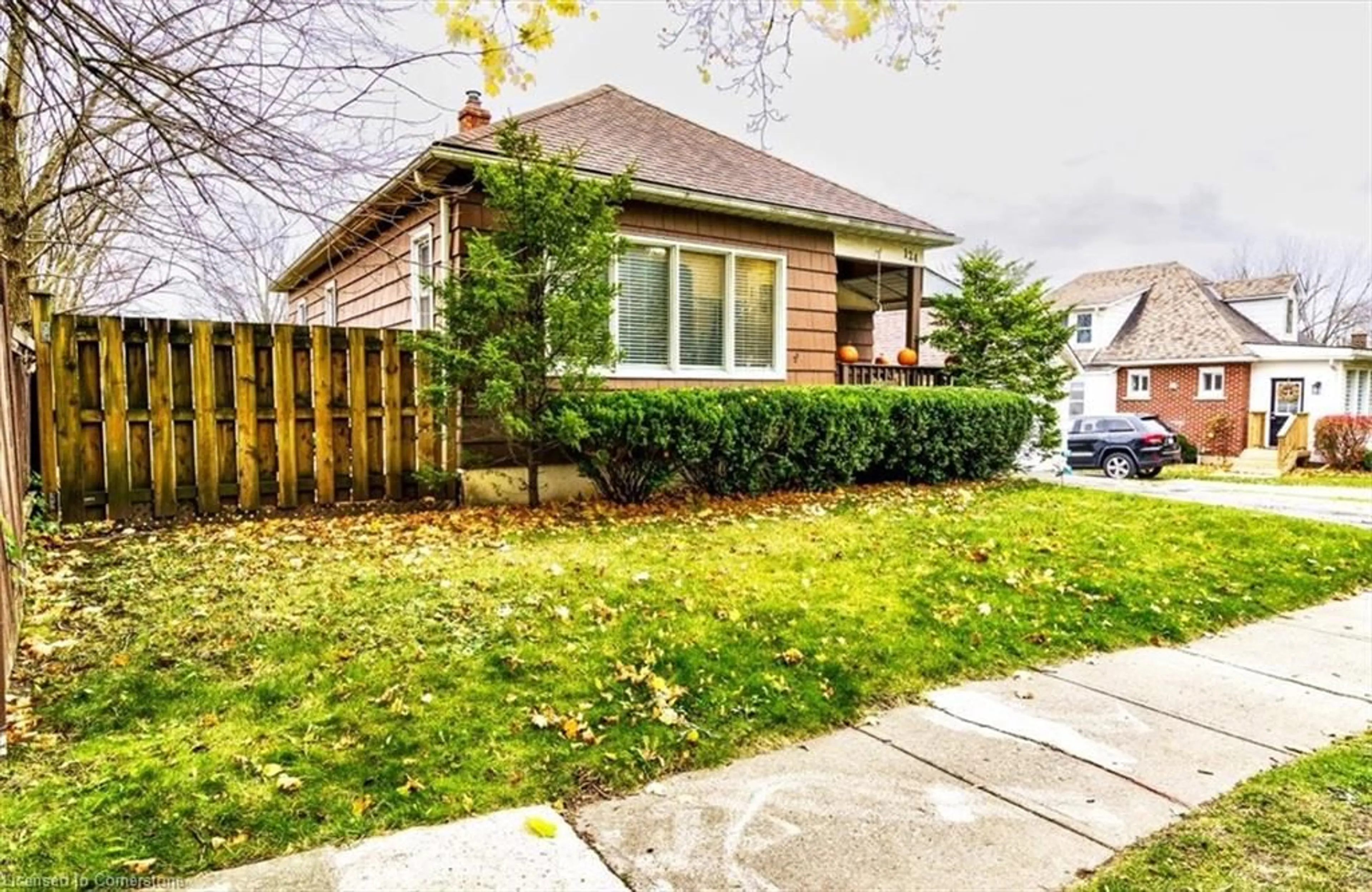 Frontside or backside of a home, the fenced backyard for 124 Victoria St, Simcoe Ontario N3Y 1L7