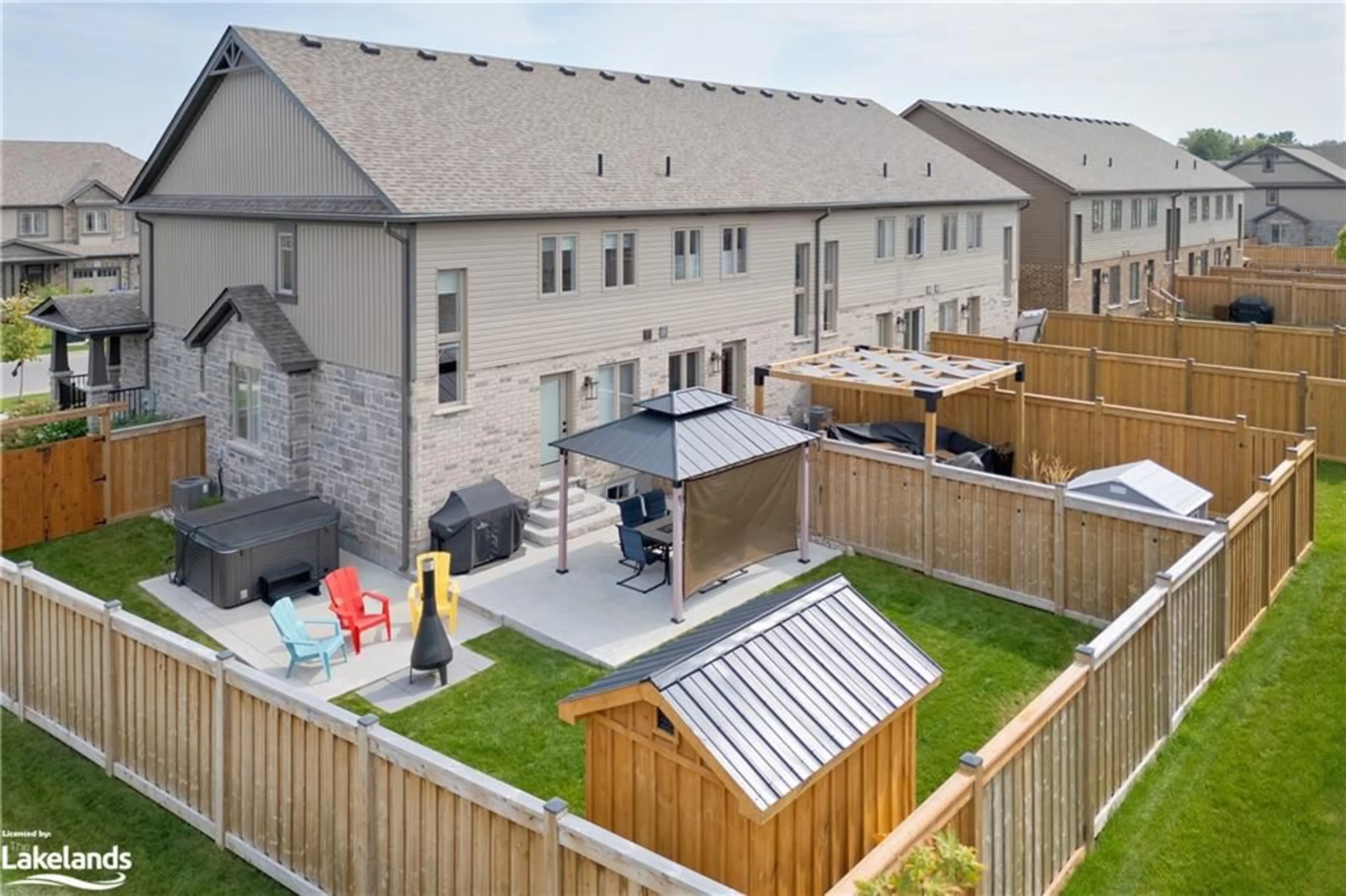 Patio, the fenced backyard for 15 Foley Crescent, Collingwood Ontario L9Y 3B7