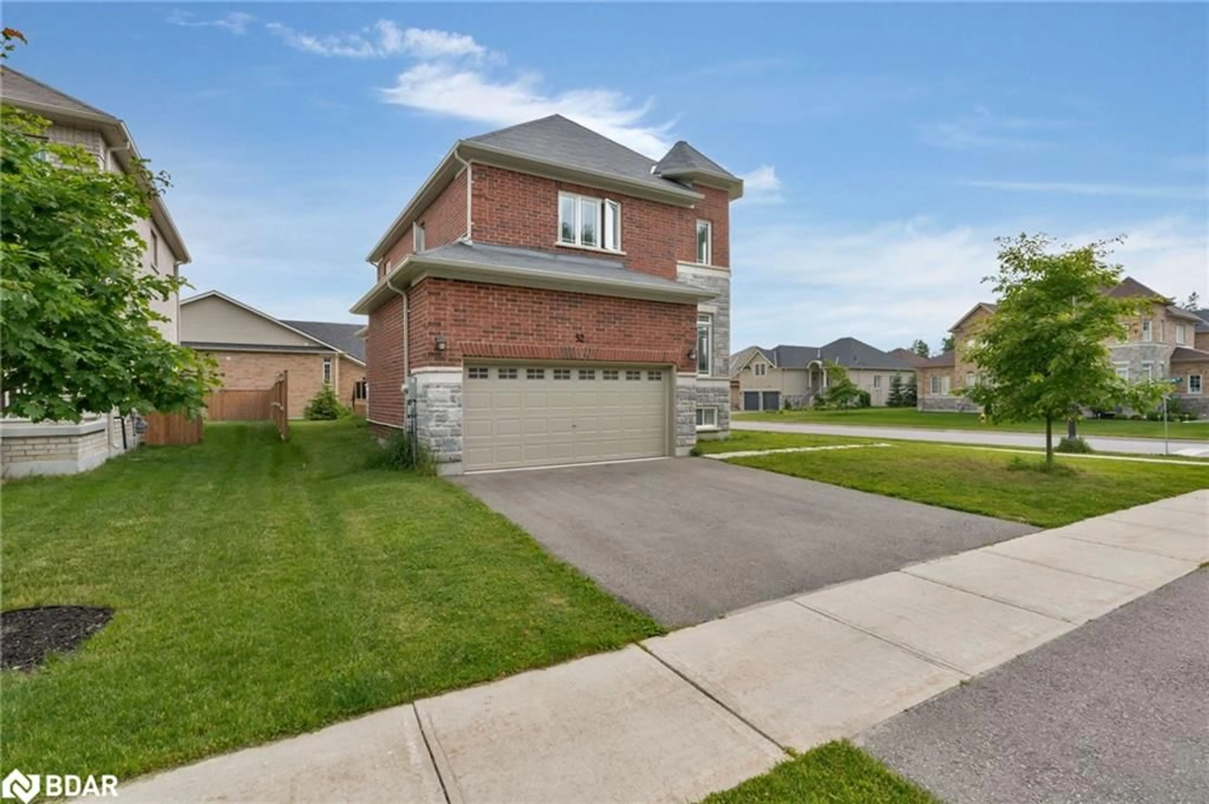 Frontside or backside of a home, the street view for 52 Pearl Street, Wasaga Beach Ontario L9Z 0G8