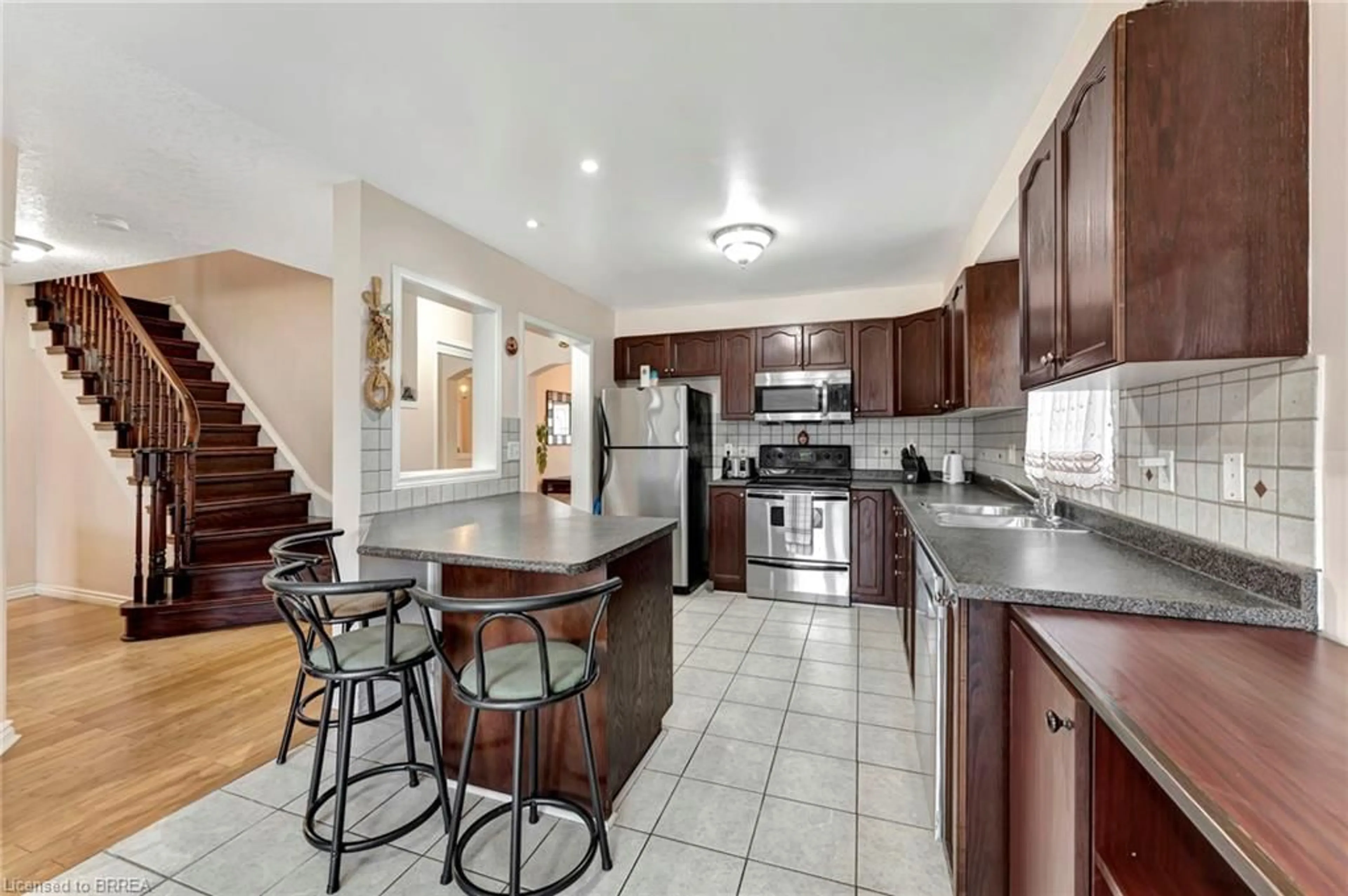 Open concept kitchen for 144 Blackburn Dr, Brantford Ontario N3T 6S2