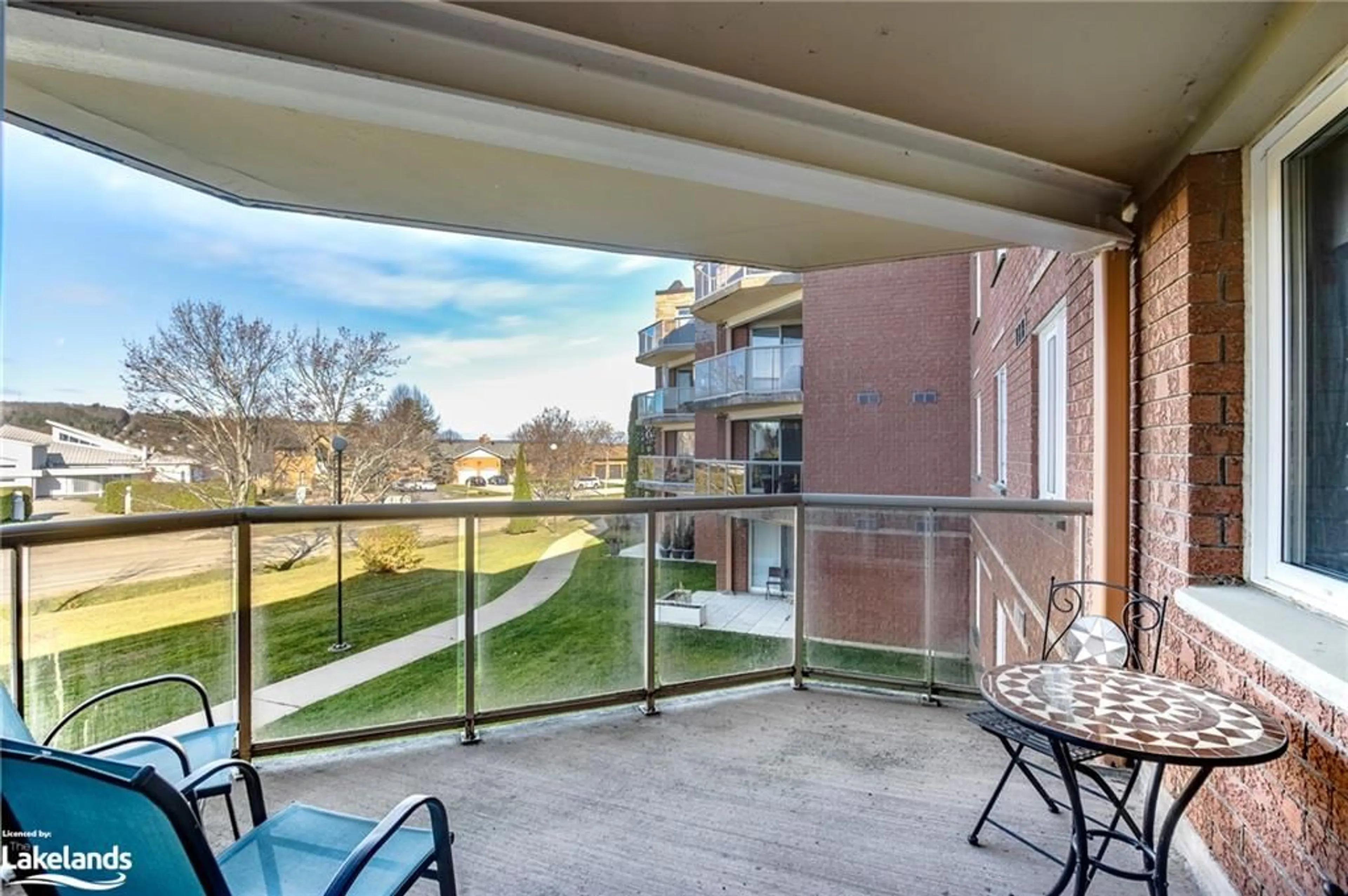 Balcony in the apartment, the fenced backyard for 11 Beck Blvd #204, Penetanguishene Ontario L9M 2G1