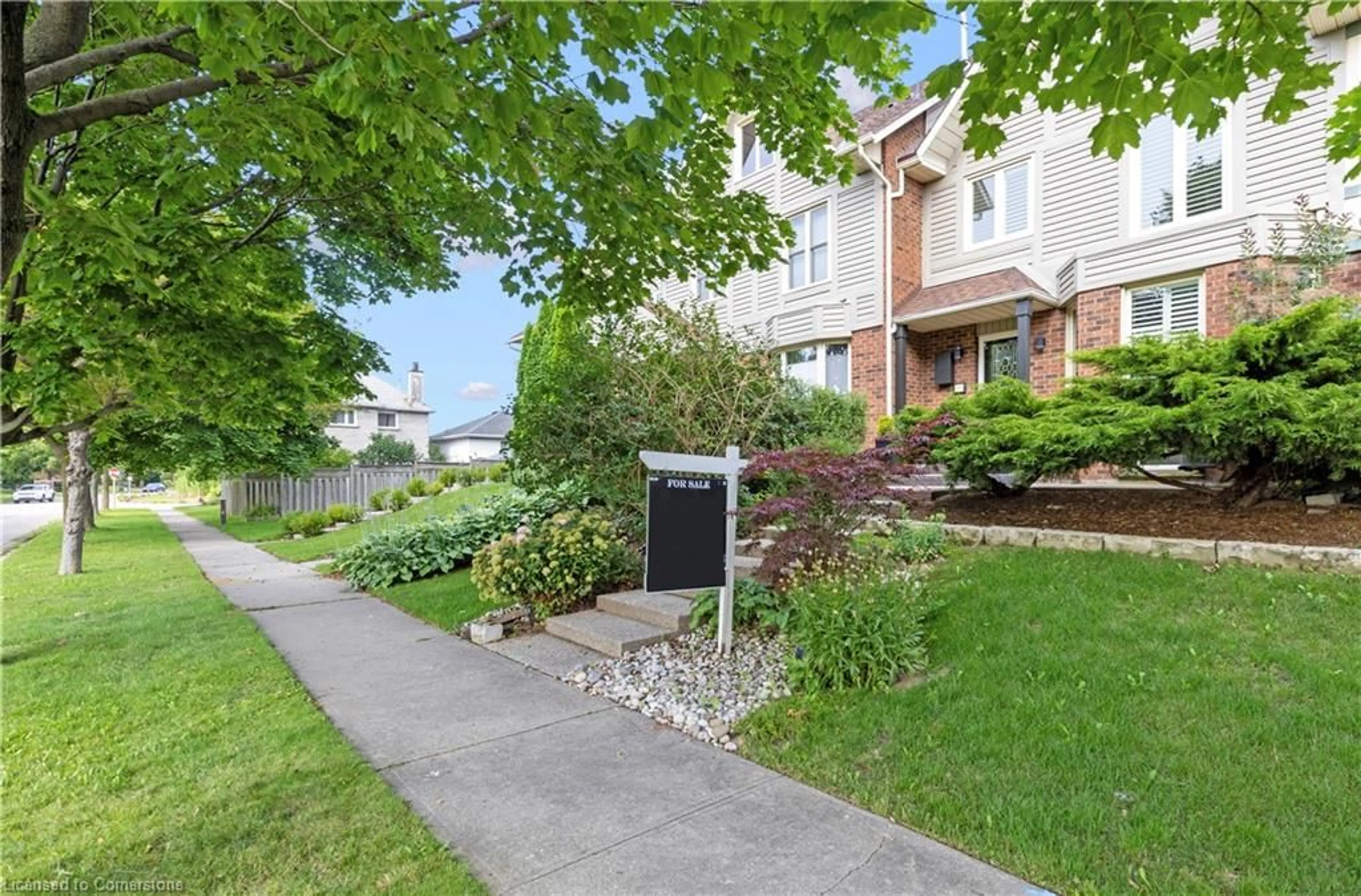 A pic from exterior of the house or condo, the fenced backyard for 11 Waterford Cres, Stoney Creek Ontario L8E 4Z8