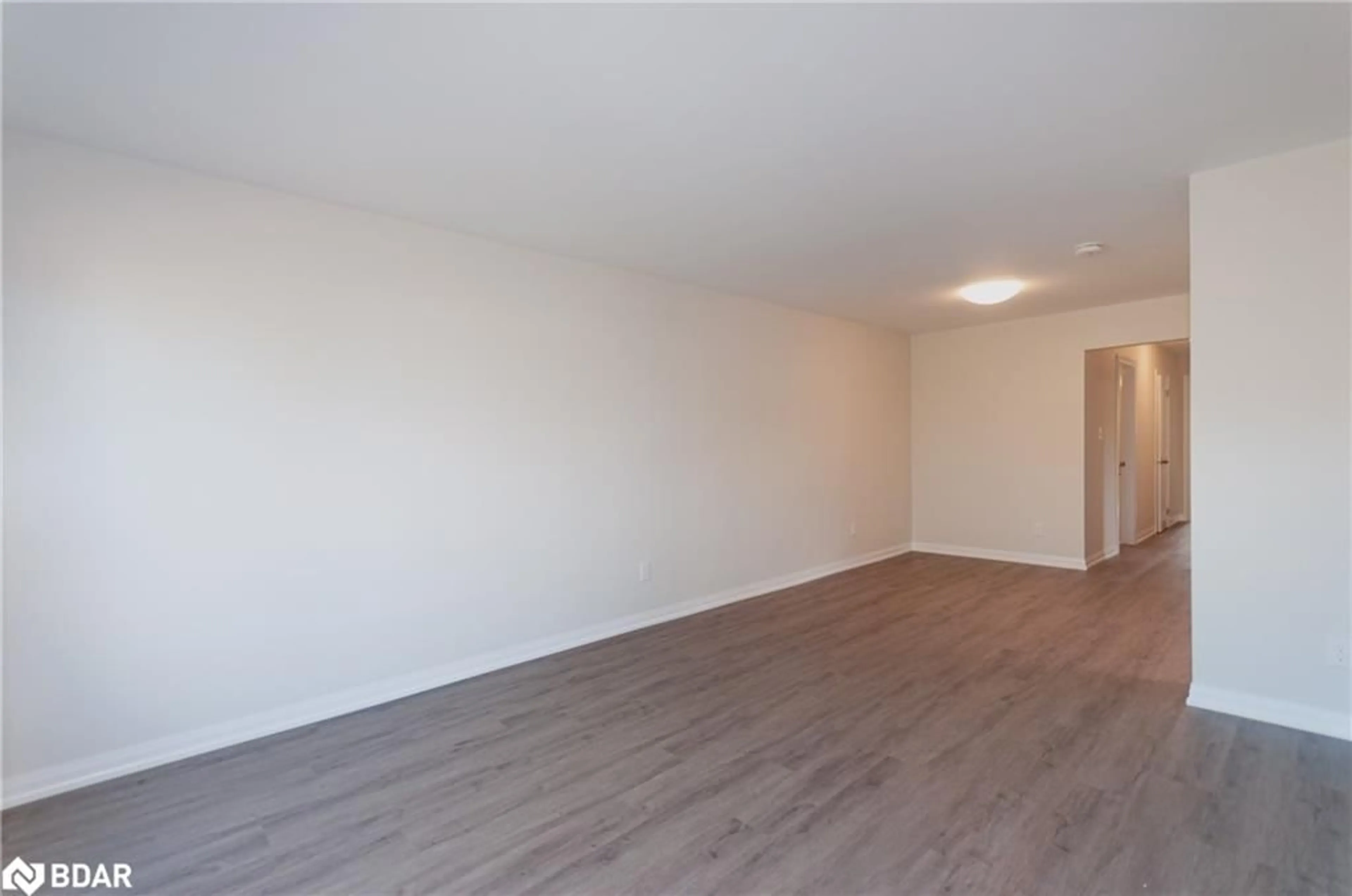 A pic of a room, wood floors for 43 Charlbrook Ave, Barrie Ontario L4M 2Y6