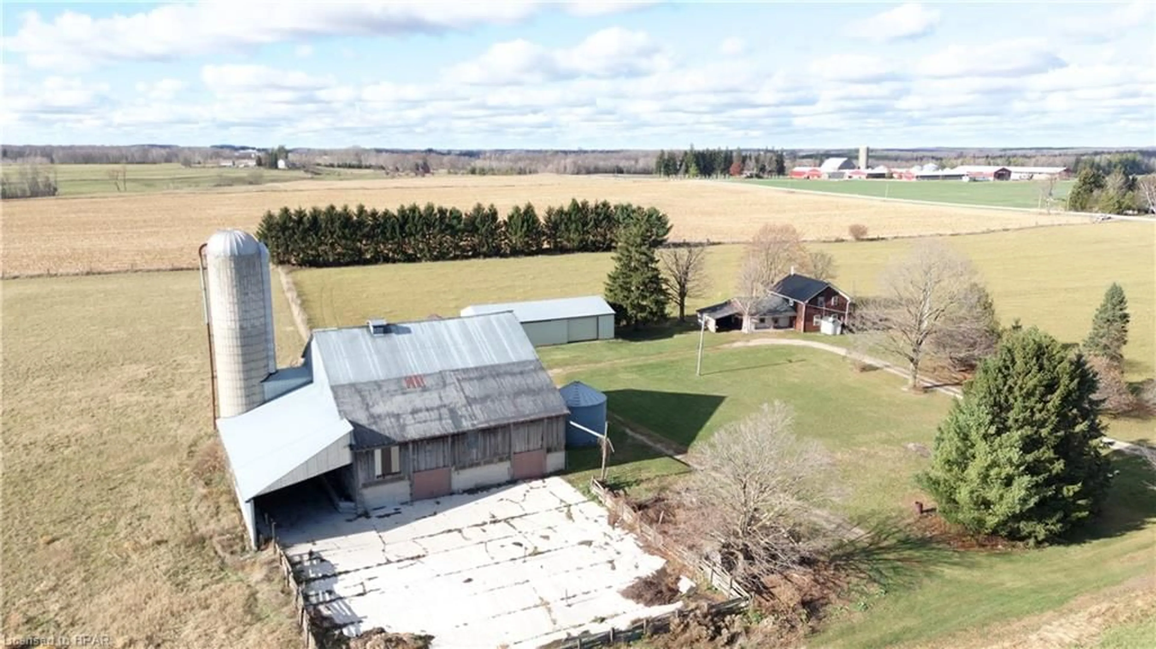 Frontside or backside of a home, the fenced backyard for 39831 Reid Rd, Wingham Ontario N0G 2W0