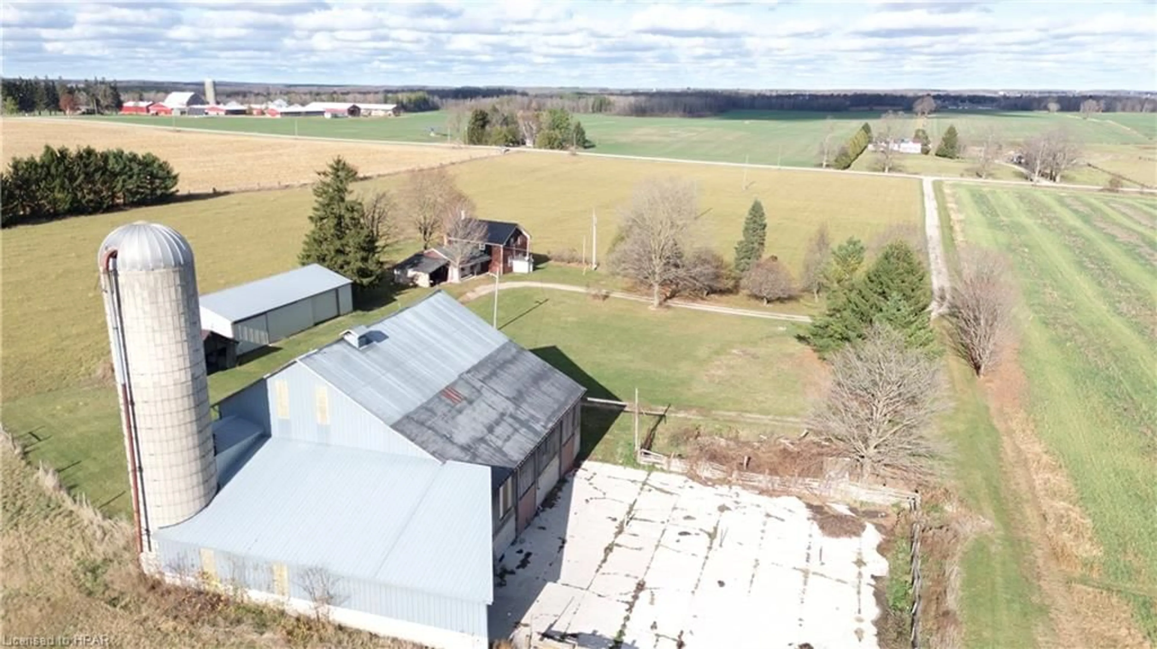 Frontside or backside of a home, the fenced backyard for 39831 Reid Rd, Wingham Ontario N0G 2W0