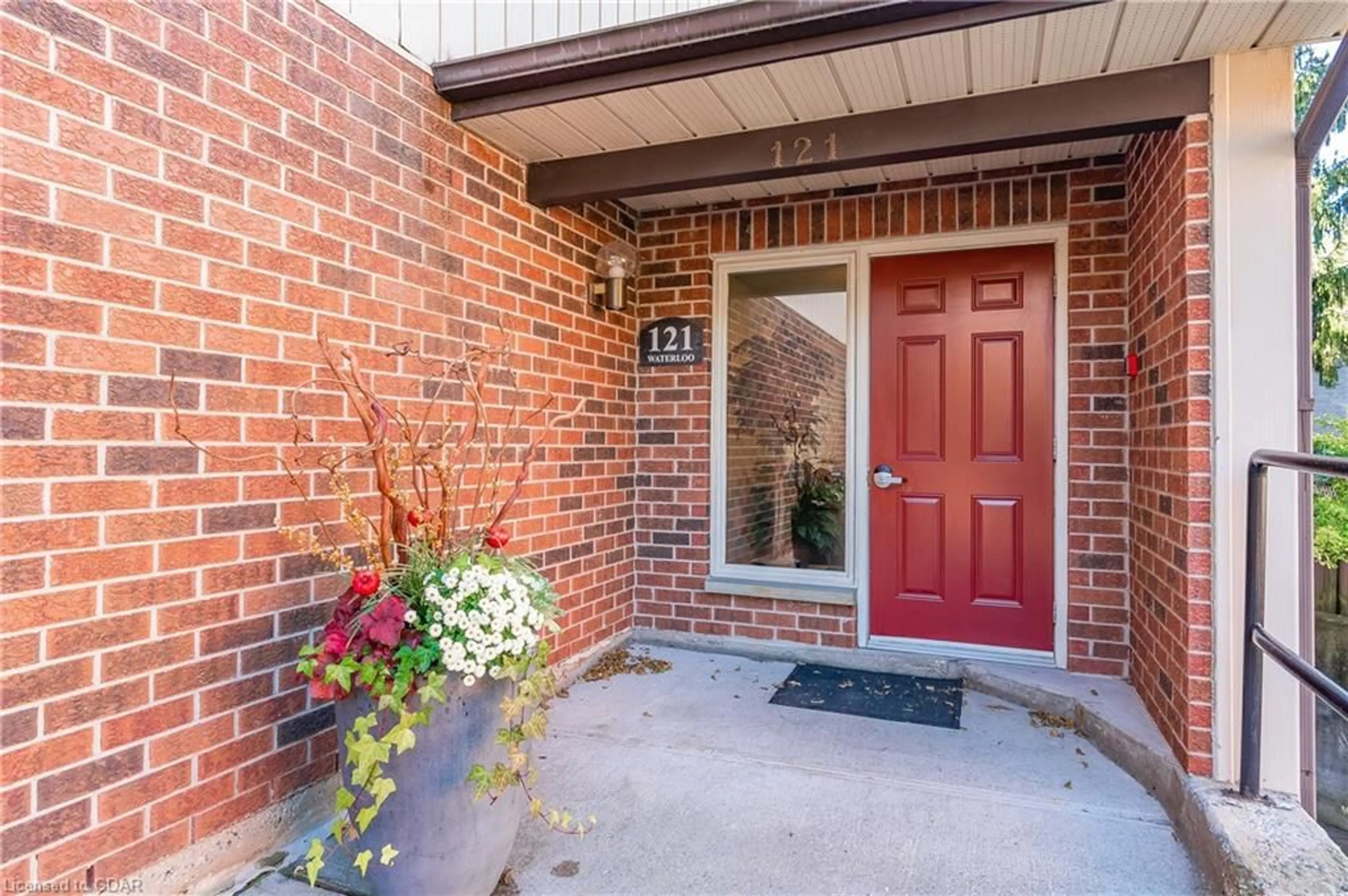 Home with brick exterior material for 121 Waterloo Ave #106, Guelph Ontario N1H 3H9