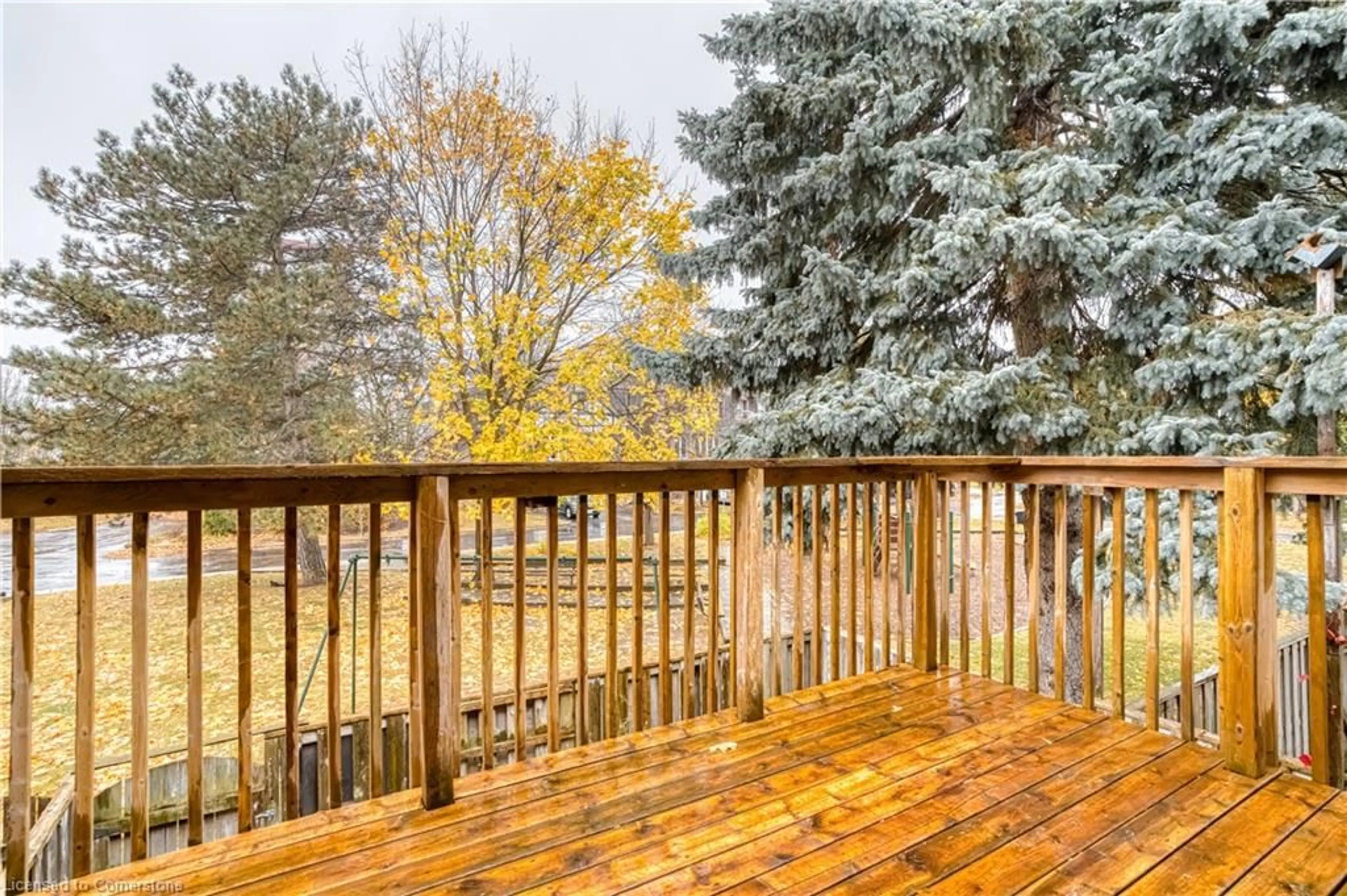 Patio, the fenced backyard for 49 Cedarwoods Cres #27, Kitchener Ontario N2C 2L1