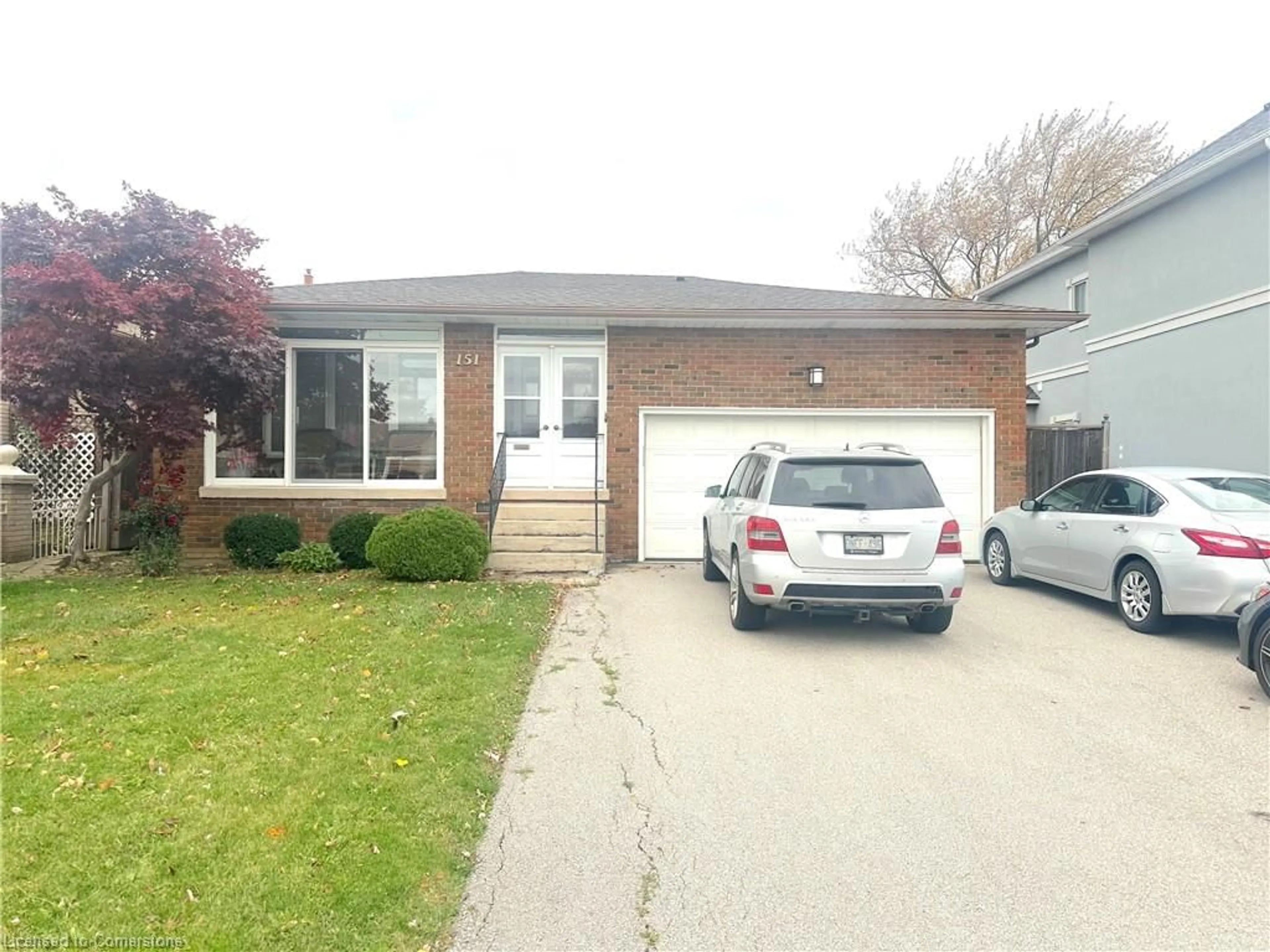 Frontside or backside of a home, the street view for 151 Homeside Ave, Hamilton Ontario L8G 3G9