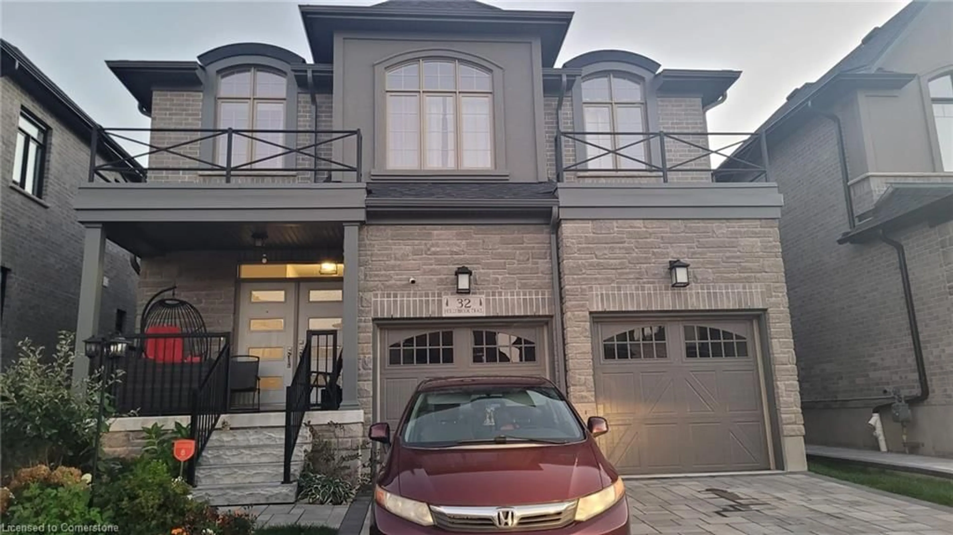 A pic from exterior of the house or condo, the street view for 32 Hollybrook Trail, Kitchener Ontario N2R 0M5