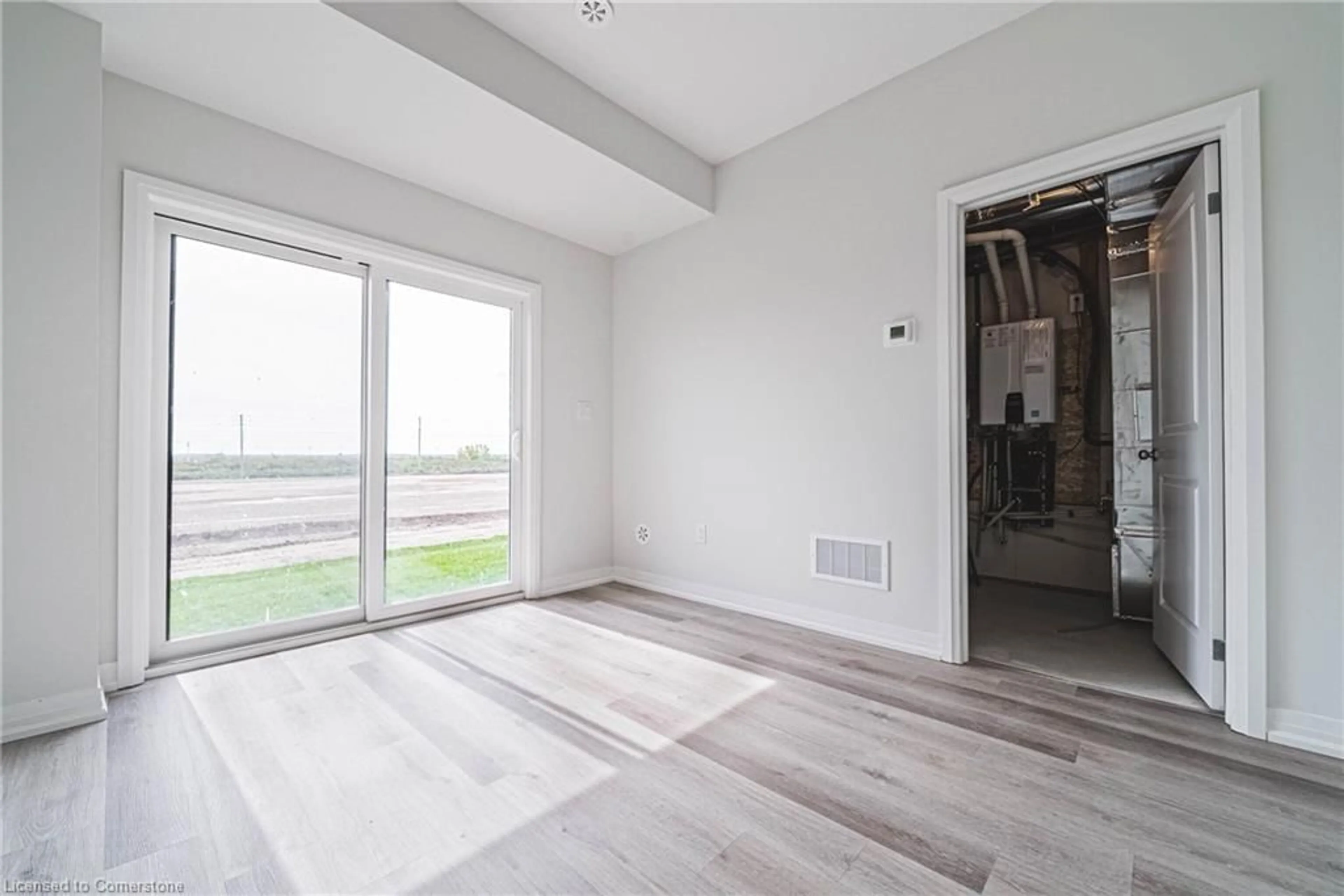 A pic of a room, wood floors for 155 Equestrian Way #88, Cambridge Ontario N3E 0E8