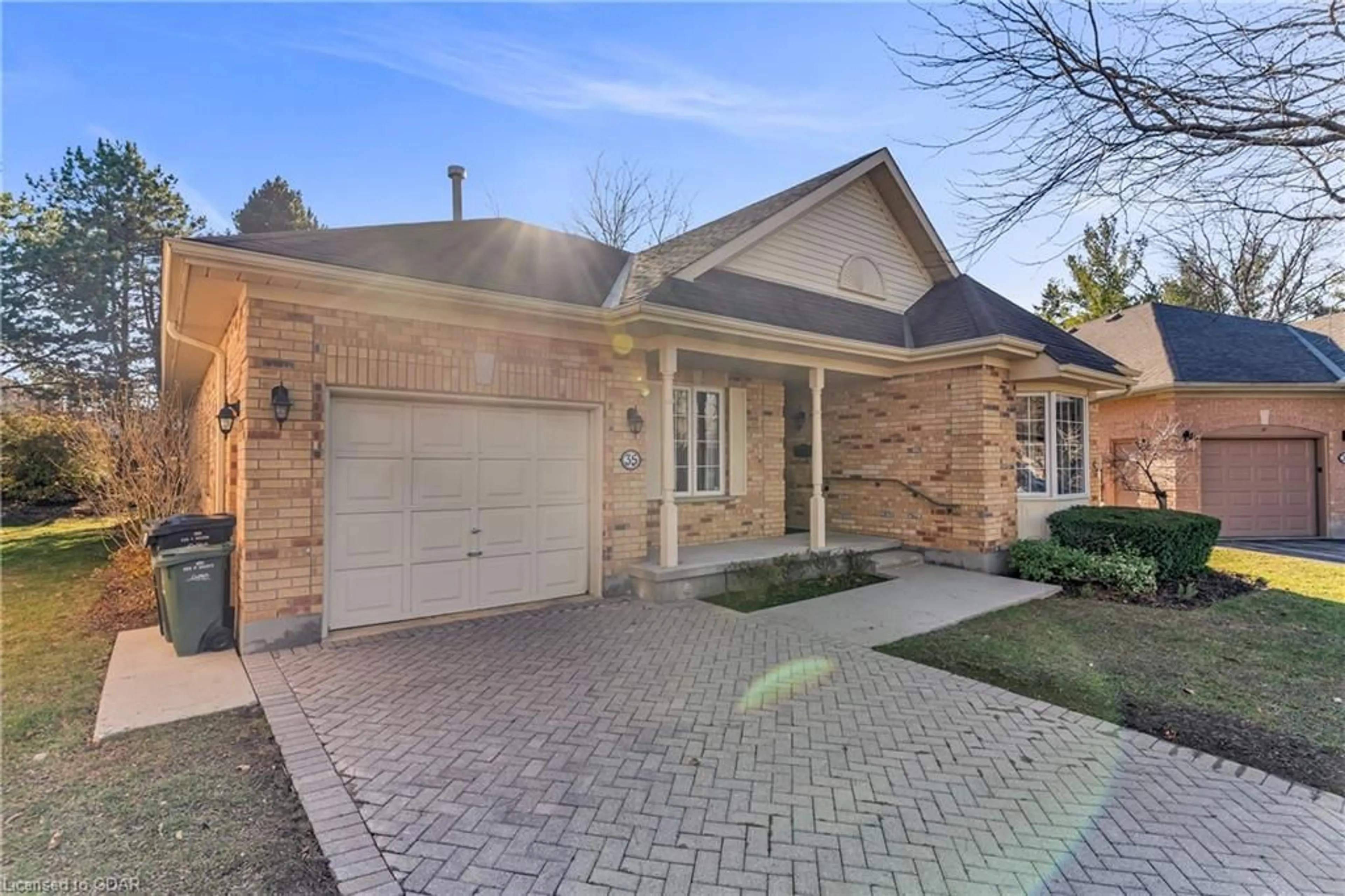 Home with brick exterior material for 35 Arbordale Walk, Guelph Ontario N1G 4X7