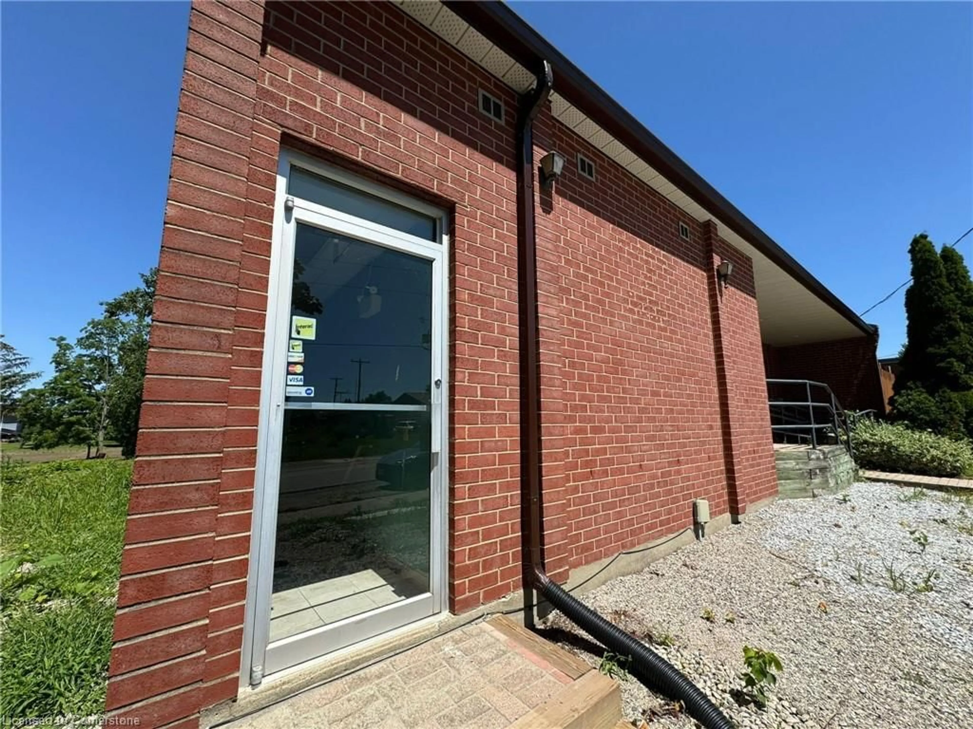 Home with brick exterior material for 93 Main St, Highgate Ontario N7M 2R2