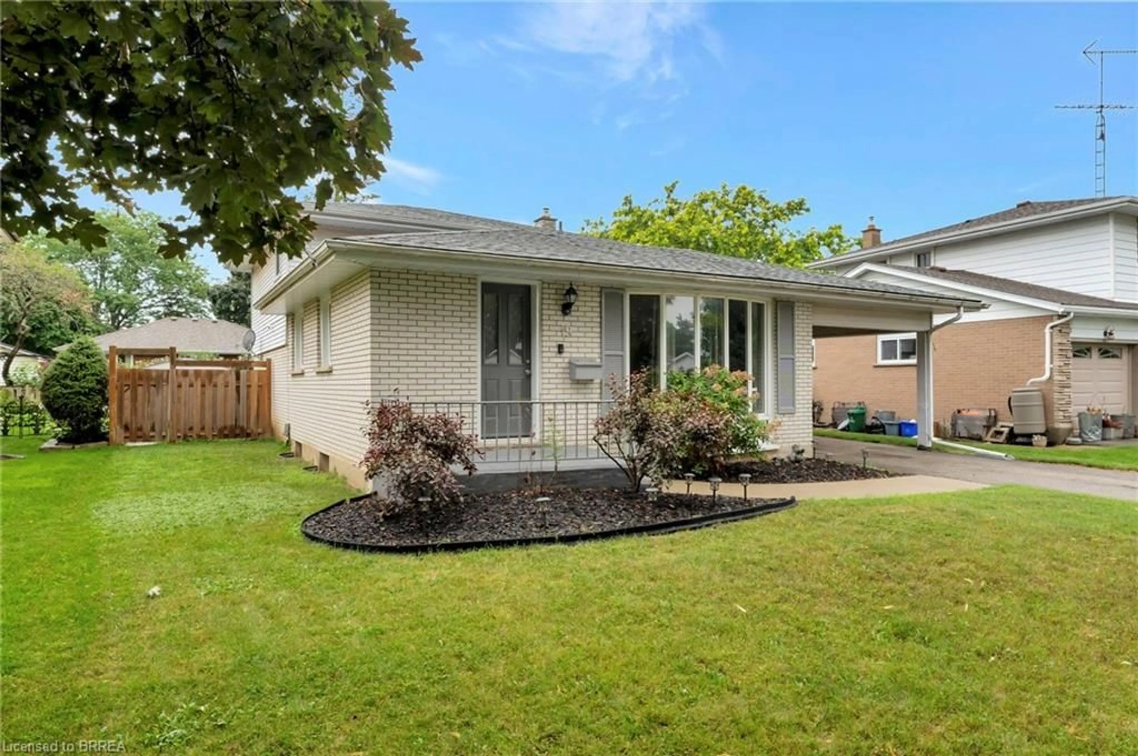 Frontside or backside of a home, the fenced backyard for 19 Frontenac Ave, Brantford Ontario N3R 3B7