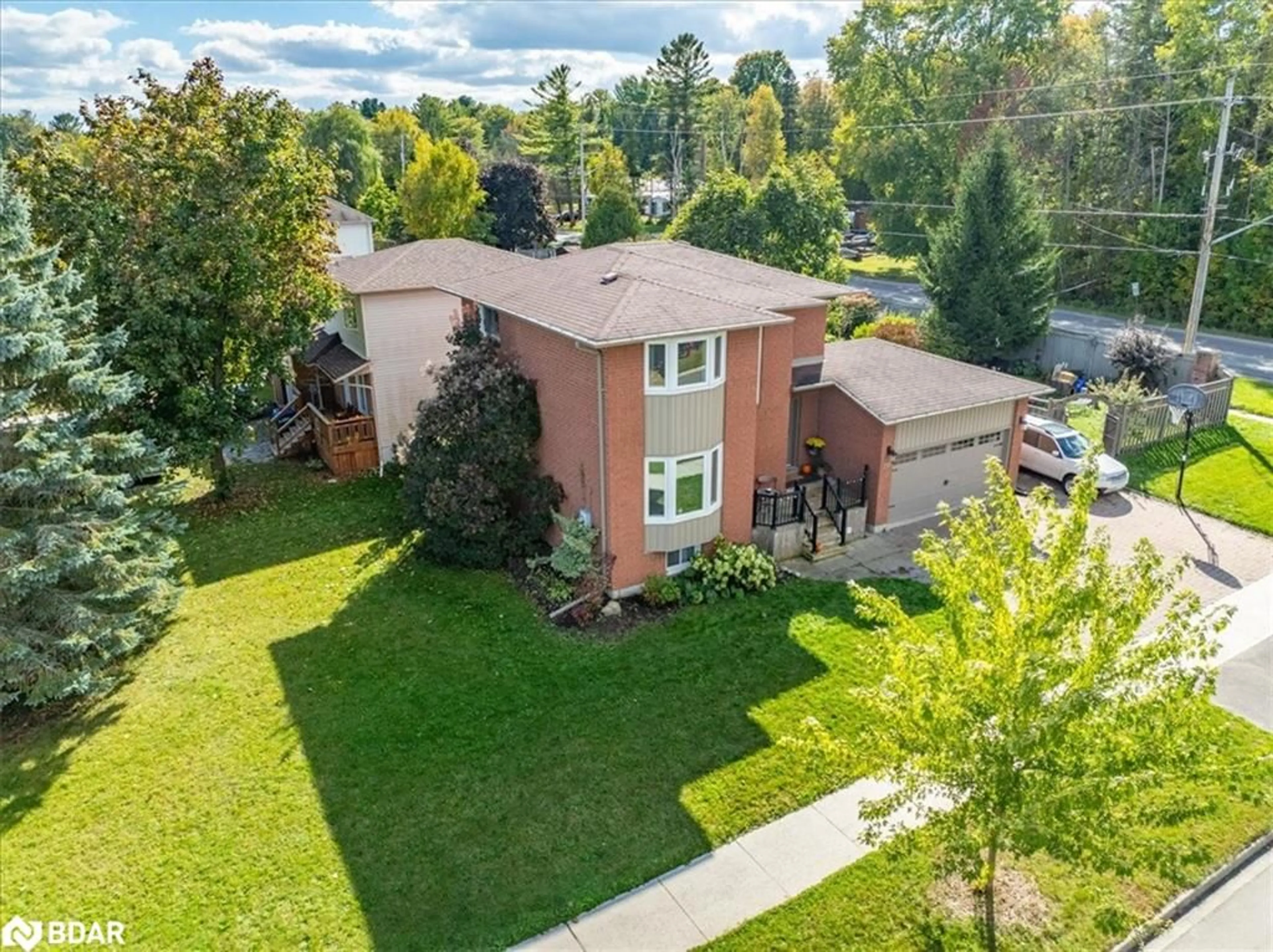 Frontside or backside of a home, the fenced backyard for 795 Rose Lane, Innisfil Ontario L9S 2H3