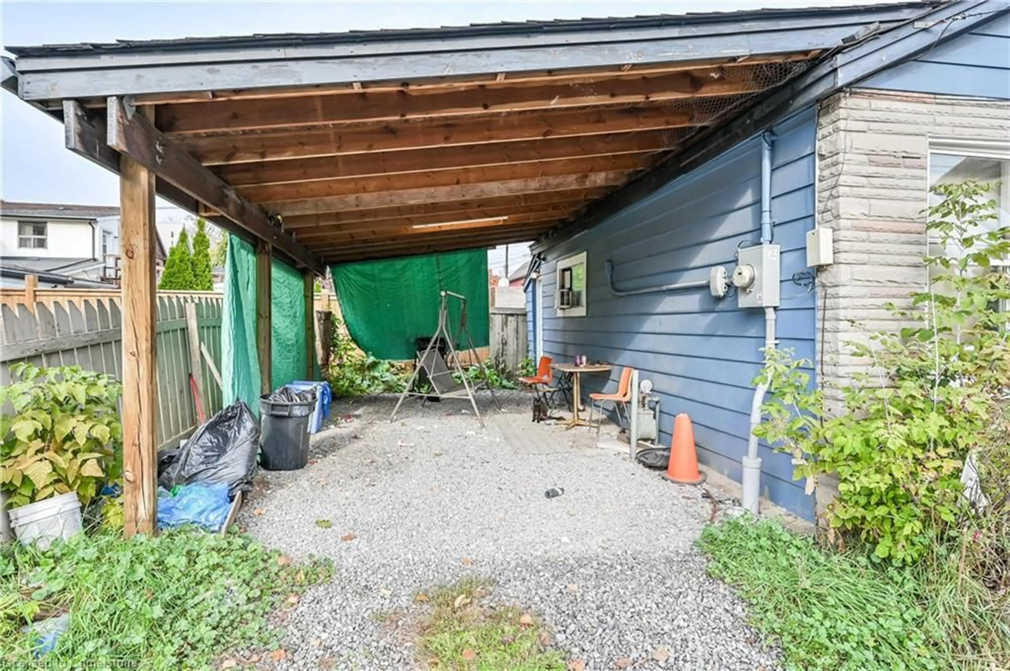 Patio, the fenced backyard for 97 Evans St, Hamilton Ontario L8L 1W6