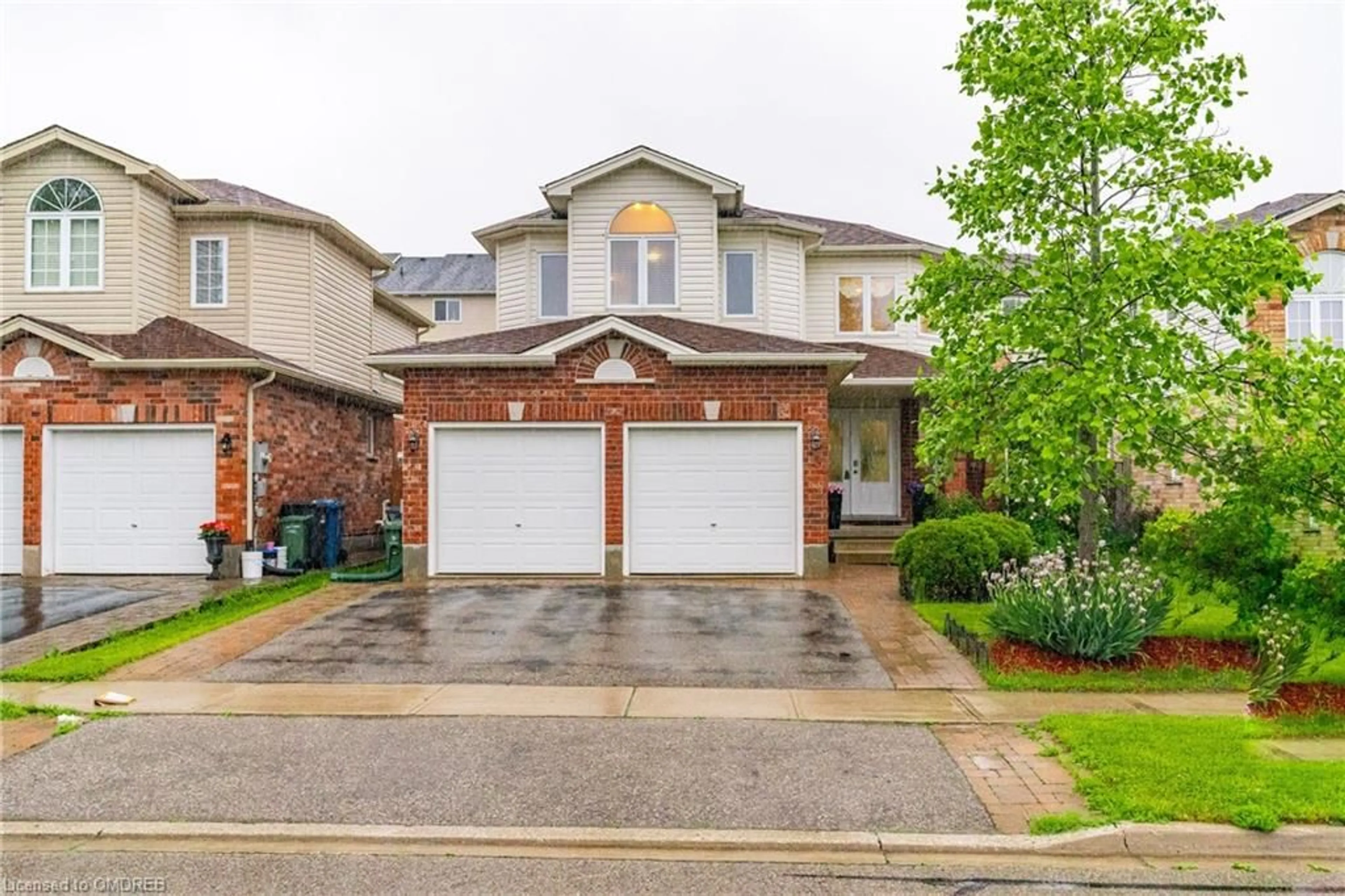 A pic from exterior of the house or condo, the street view for 12 Zecca Dr, Guelph Ontario N1L 1T1