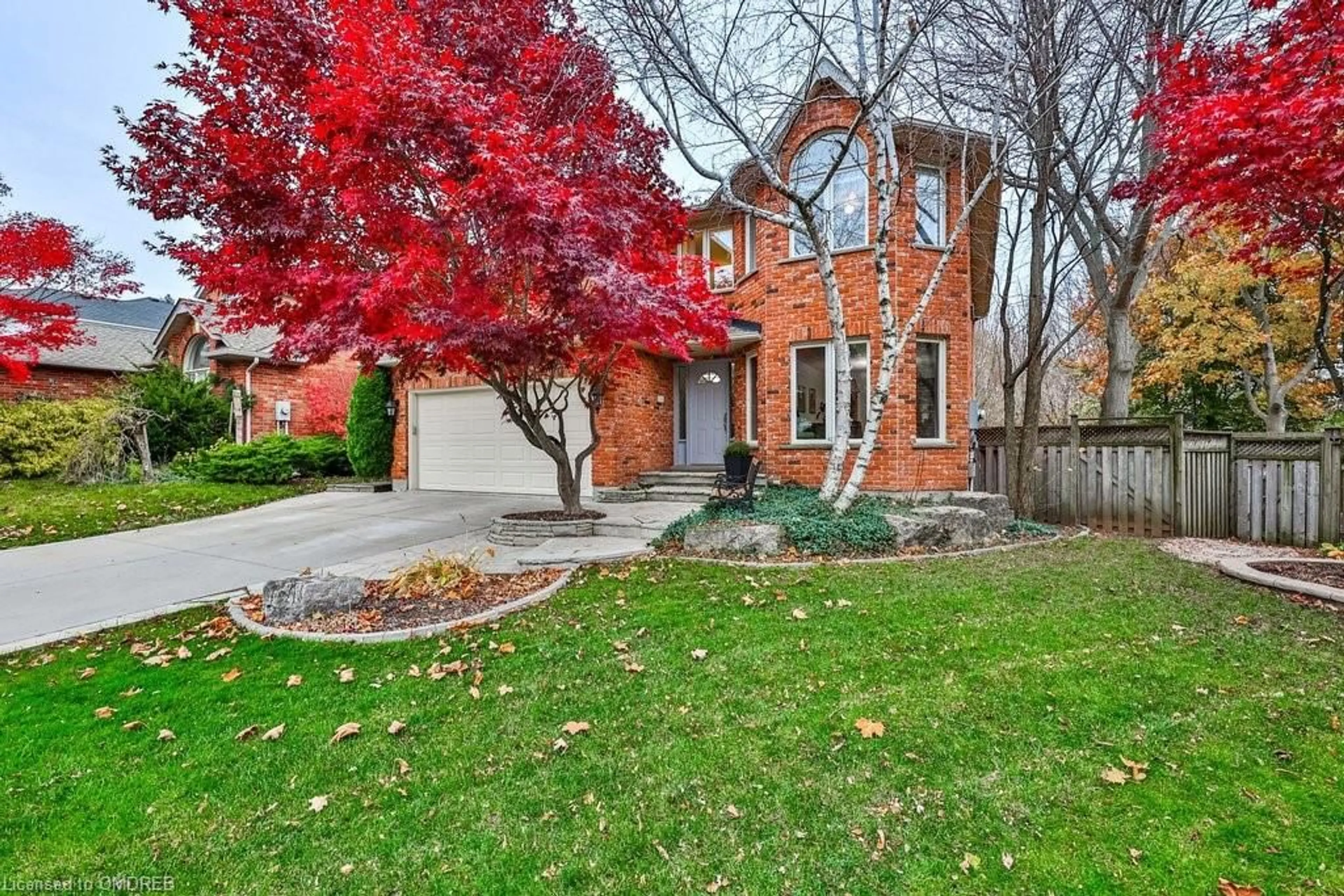 A pic from exterior of the house or condo, the fenced backyard for 2134 Berryman Crt, Burlington Ontario L7M 2Y8