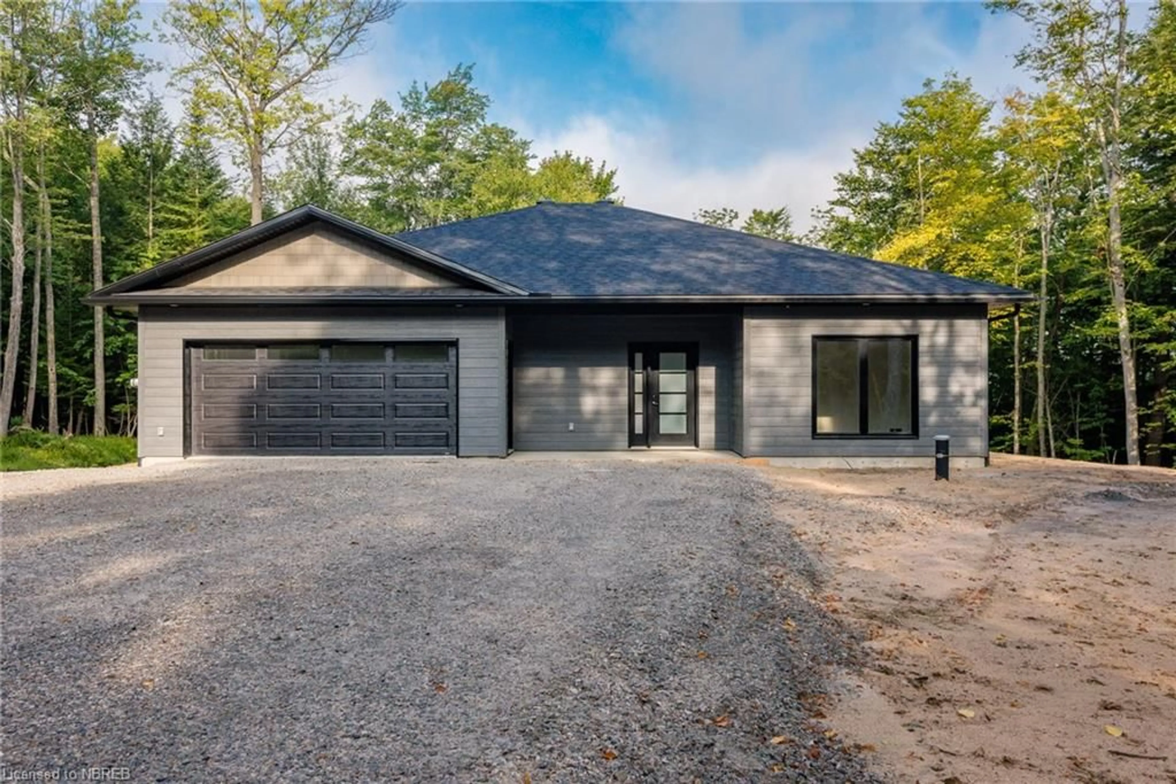 Home with brick exterior material for 24 Aspen Lane, Powassan Ontario P0H 1Z0