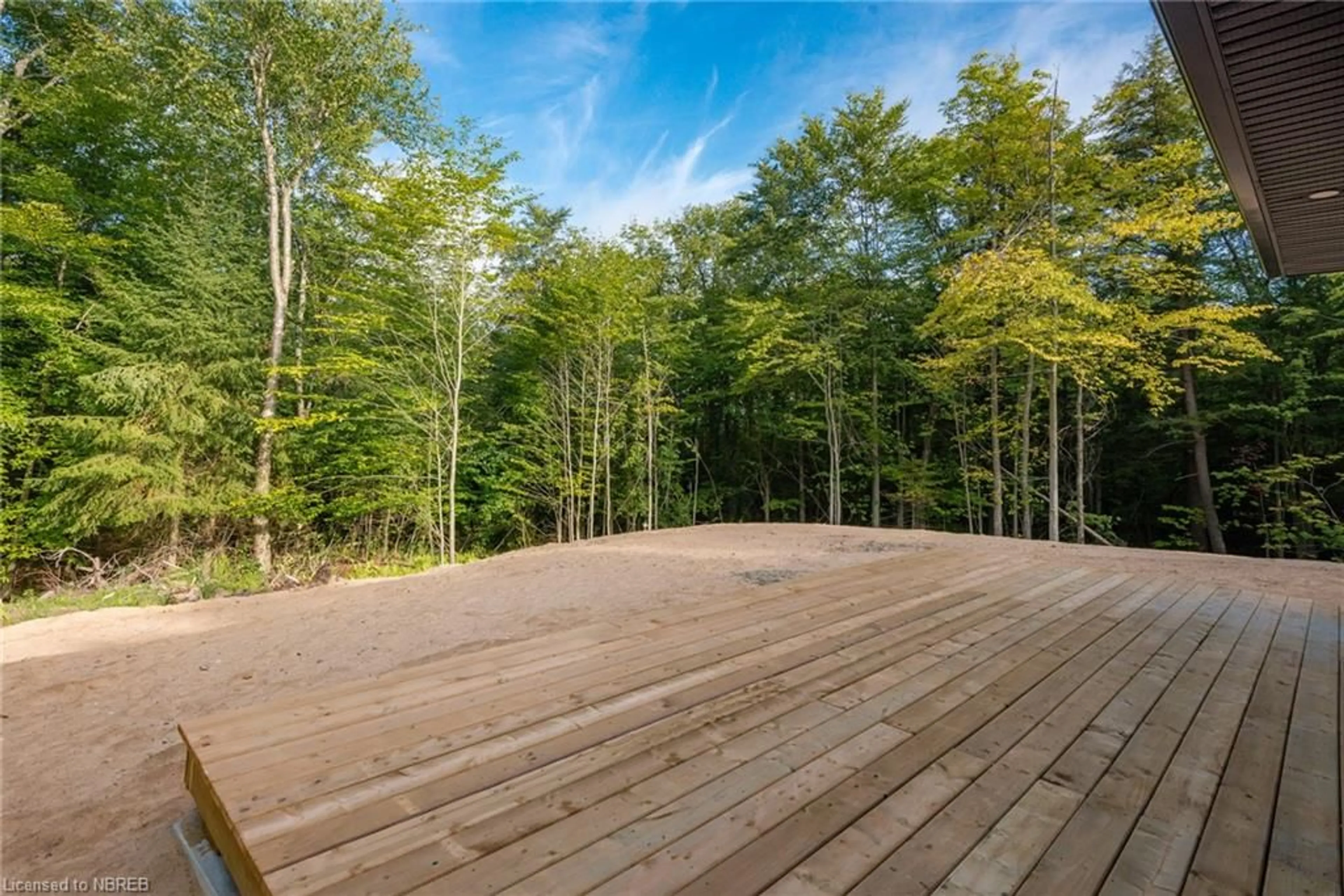 Patio, the fenced backyard for 24 Aspen Lane, Powassan Ontario P0H 1Z0