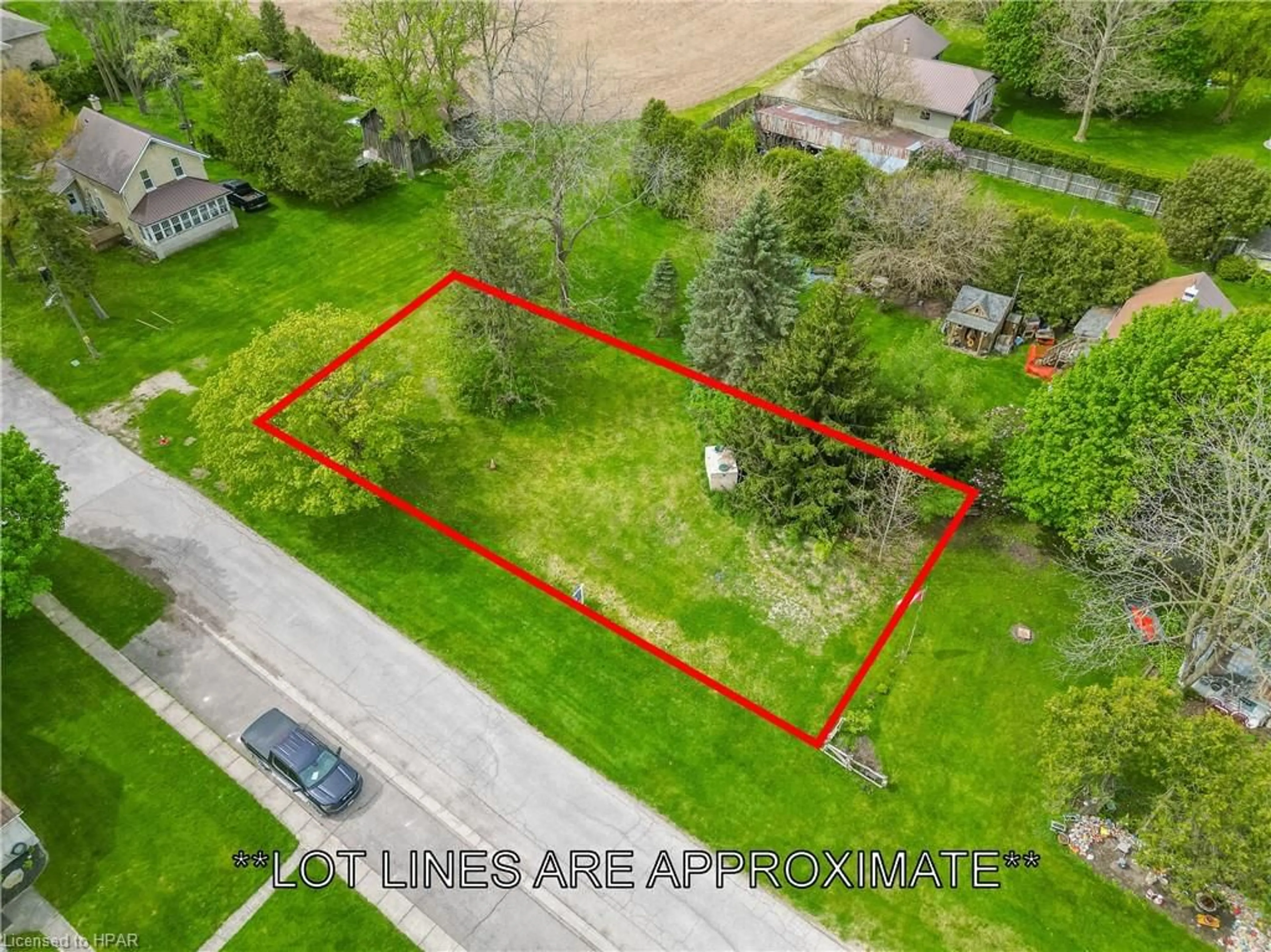 Frontside or backside of a home, the fenced backyard for LT 42 Emla St, Dashwood Ontario N0M 1N0