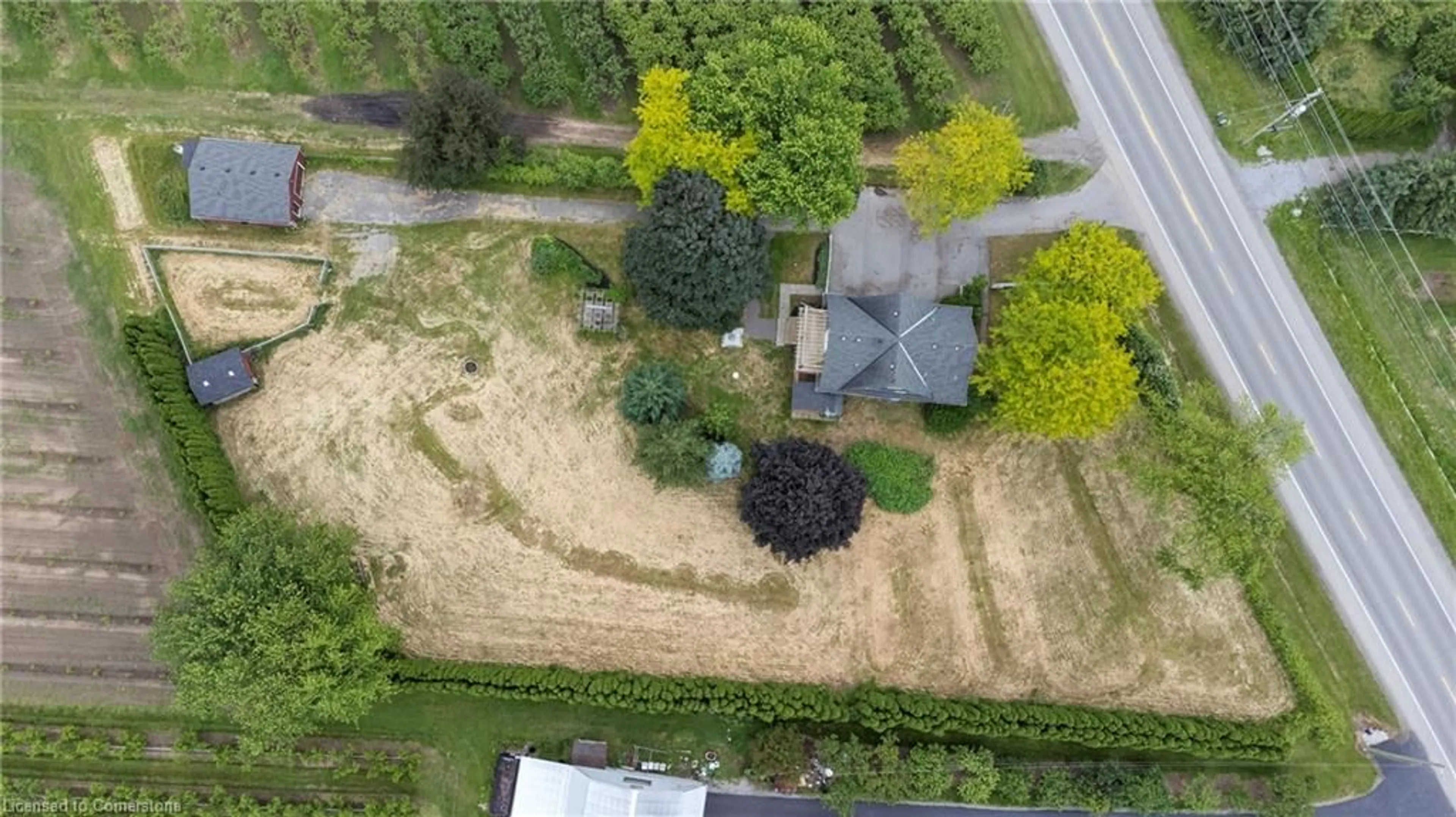 Frontside or backside of a home, the fenced backyard for 630 Lakeshore Rd, Niagara-on-the-Lake Ontario L0S 1J0