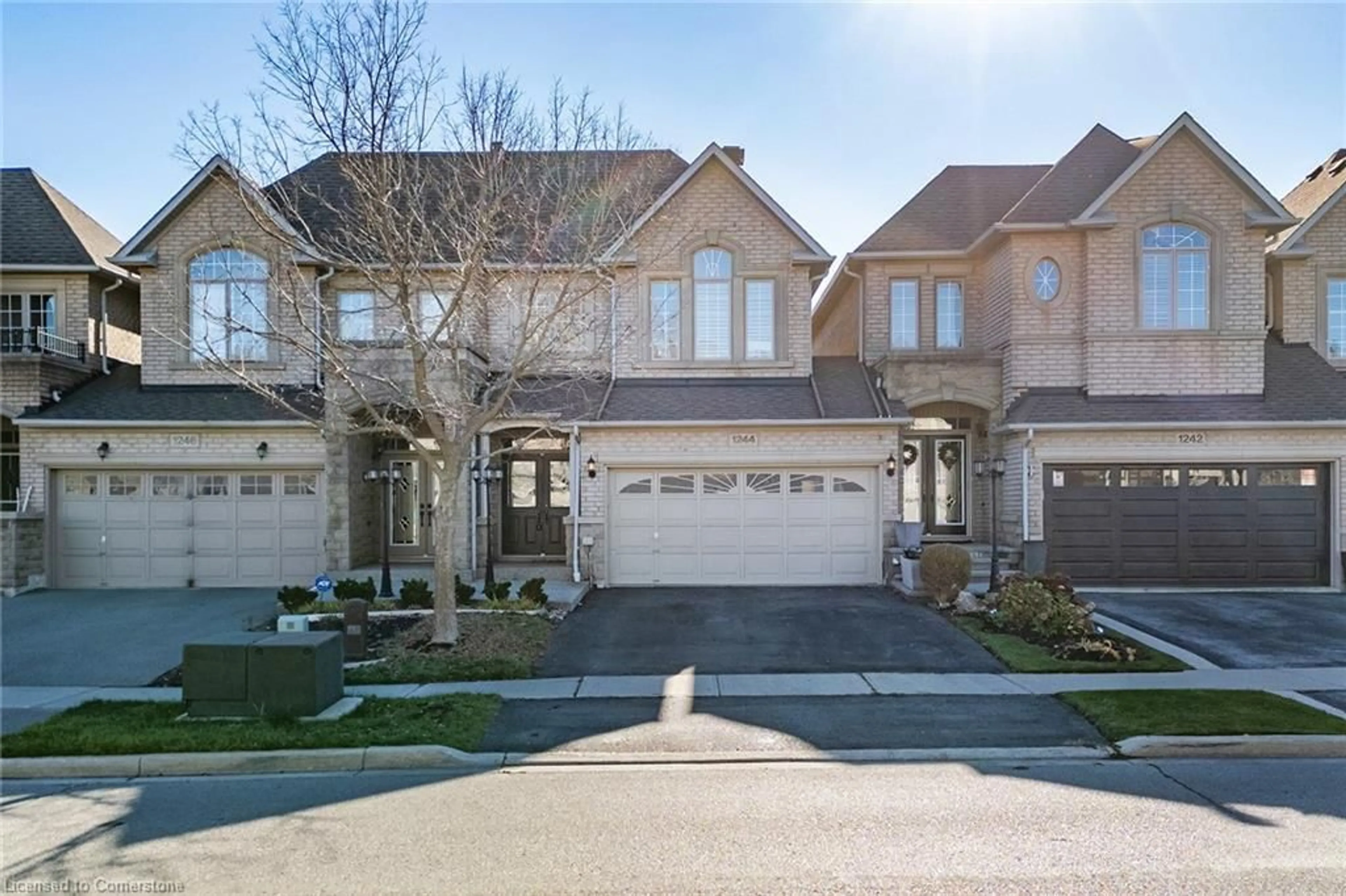 Frontside or backside of a home, the street view for 1244 Agram Dr, Oakville Ontario L6H 7N9