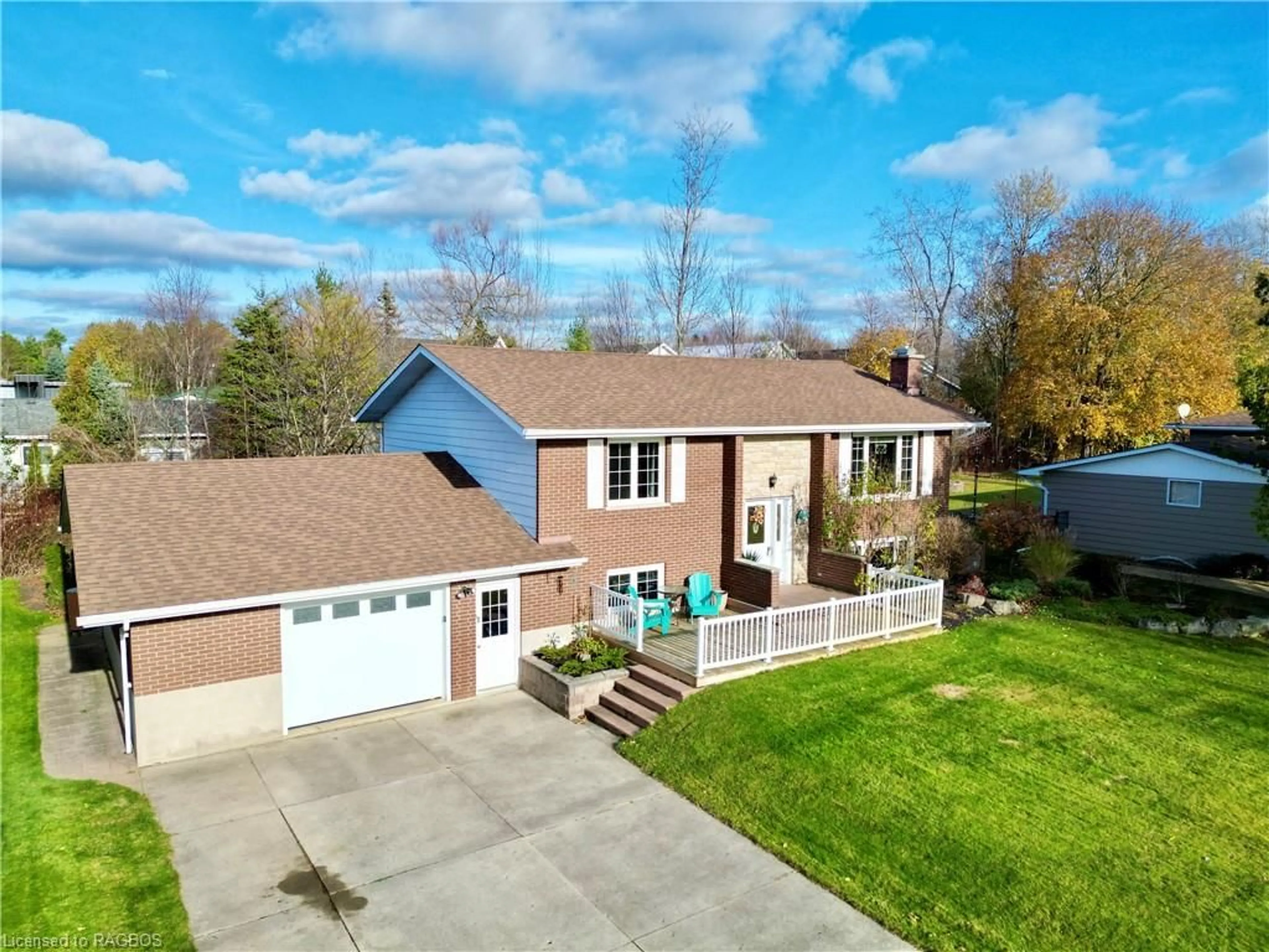 Frontside or backside of a home, the fenced backyard for 34 Archibald Pl, Southampton Ontario N0H 2L0