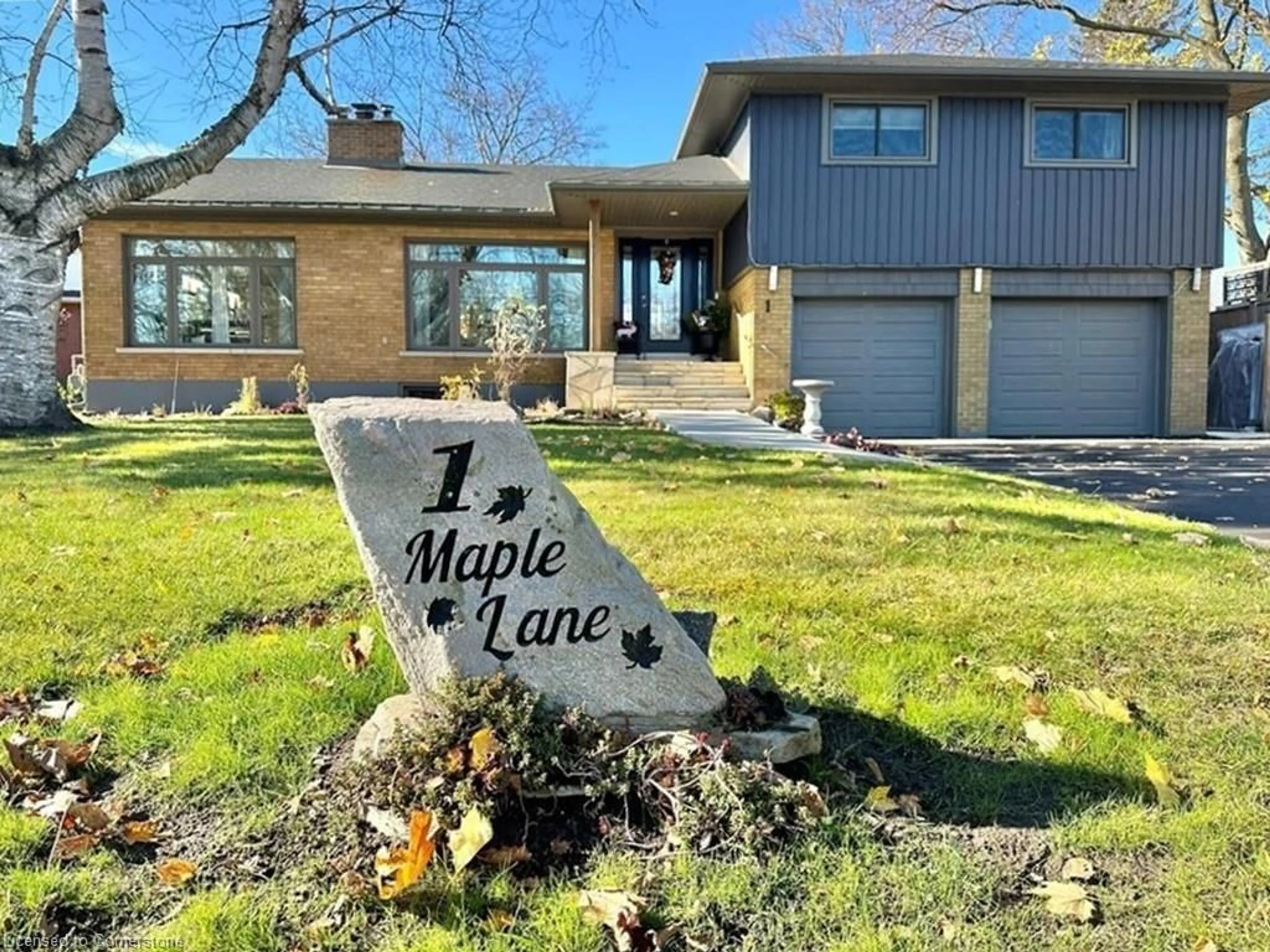 Frontside or backside of a home, the street view for 1 Maple Lane, Tillsonburg Ontario N4G 2Y5