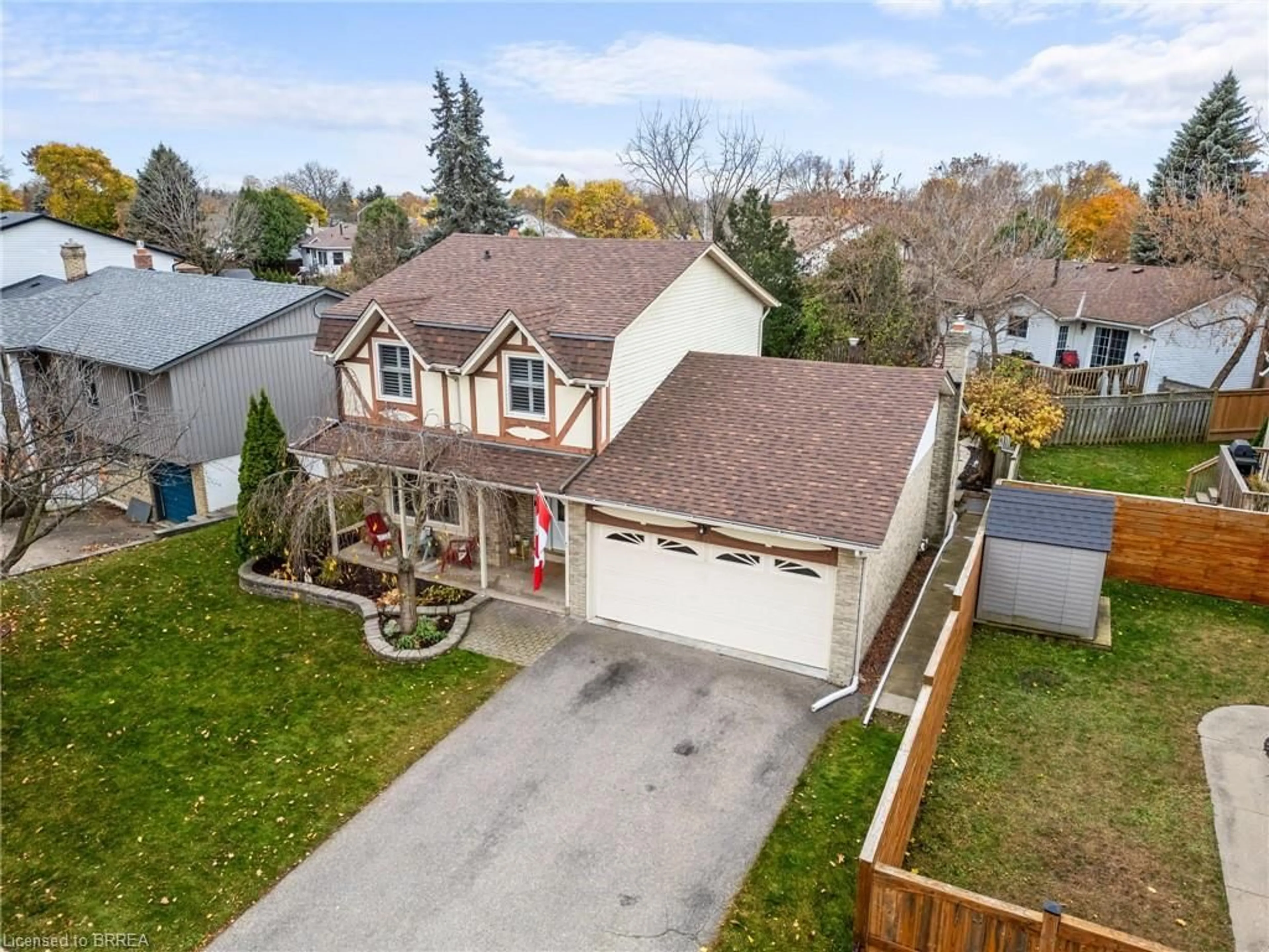 Frontside or backside of a home, the fenced backyard for 37 Dorchester Ave, Brantford Ontario N3R 5G3