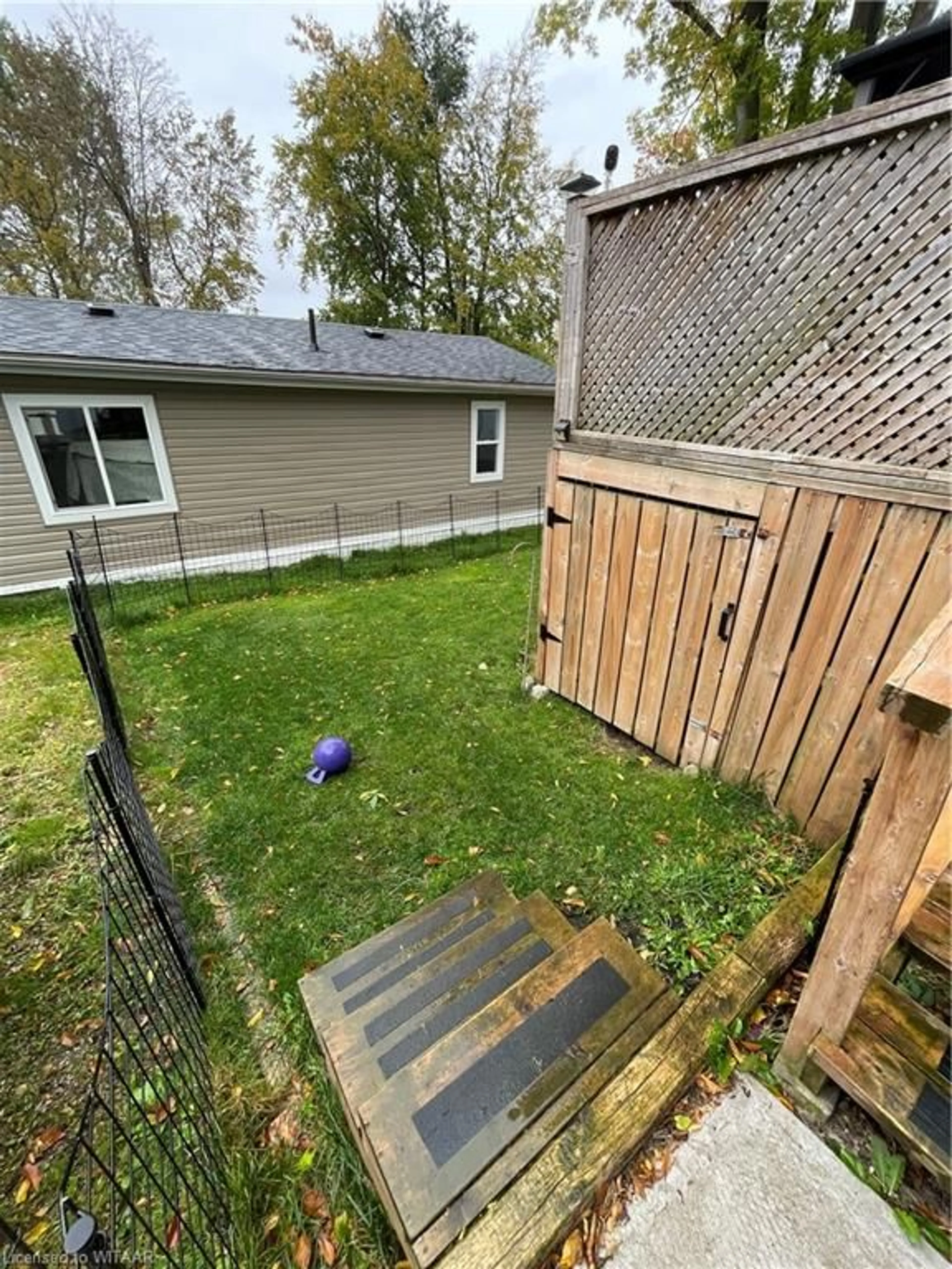 Patio, the fenced backyard for 596101 Highway 59 #106, East Zorra Tavistock Ontario N4S 7W1