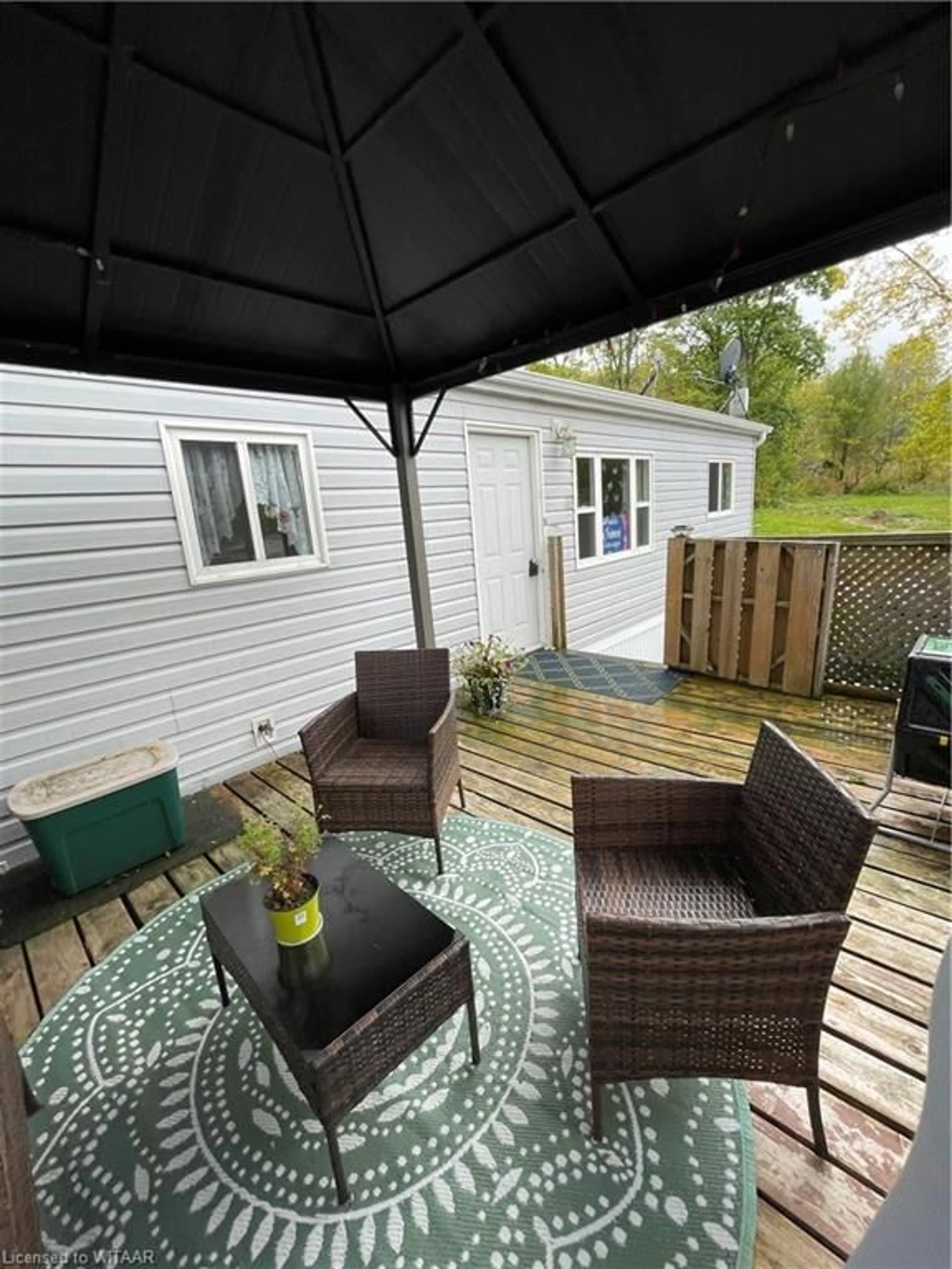 Patio, the fenced backyard for 596101 Highway 59 #106, East Zorra Tavistock Ontario N4S 7W1