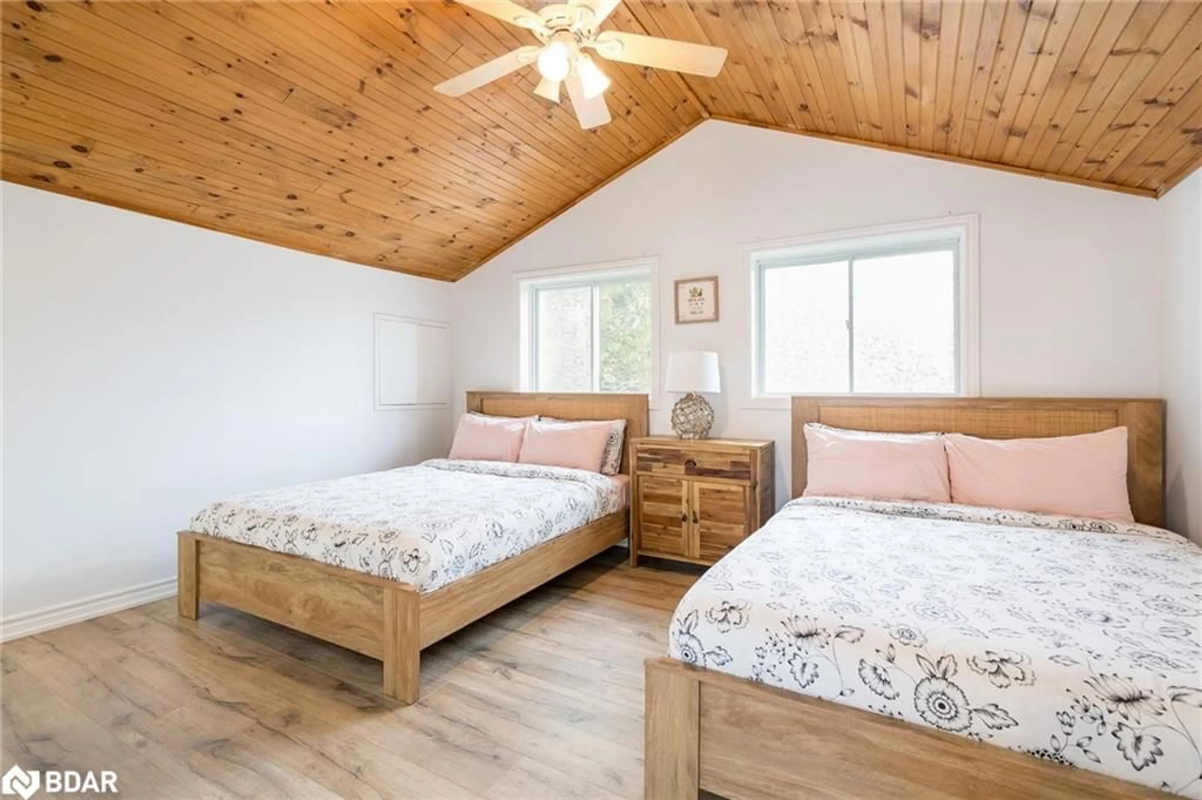 Bedroom, wood floors for 122 Mitchells Beach Rd, Tay Ontario L0K 2A0