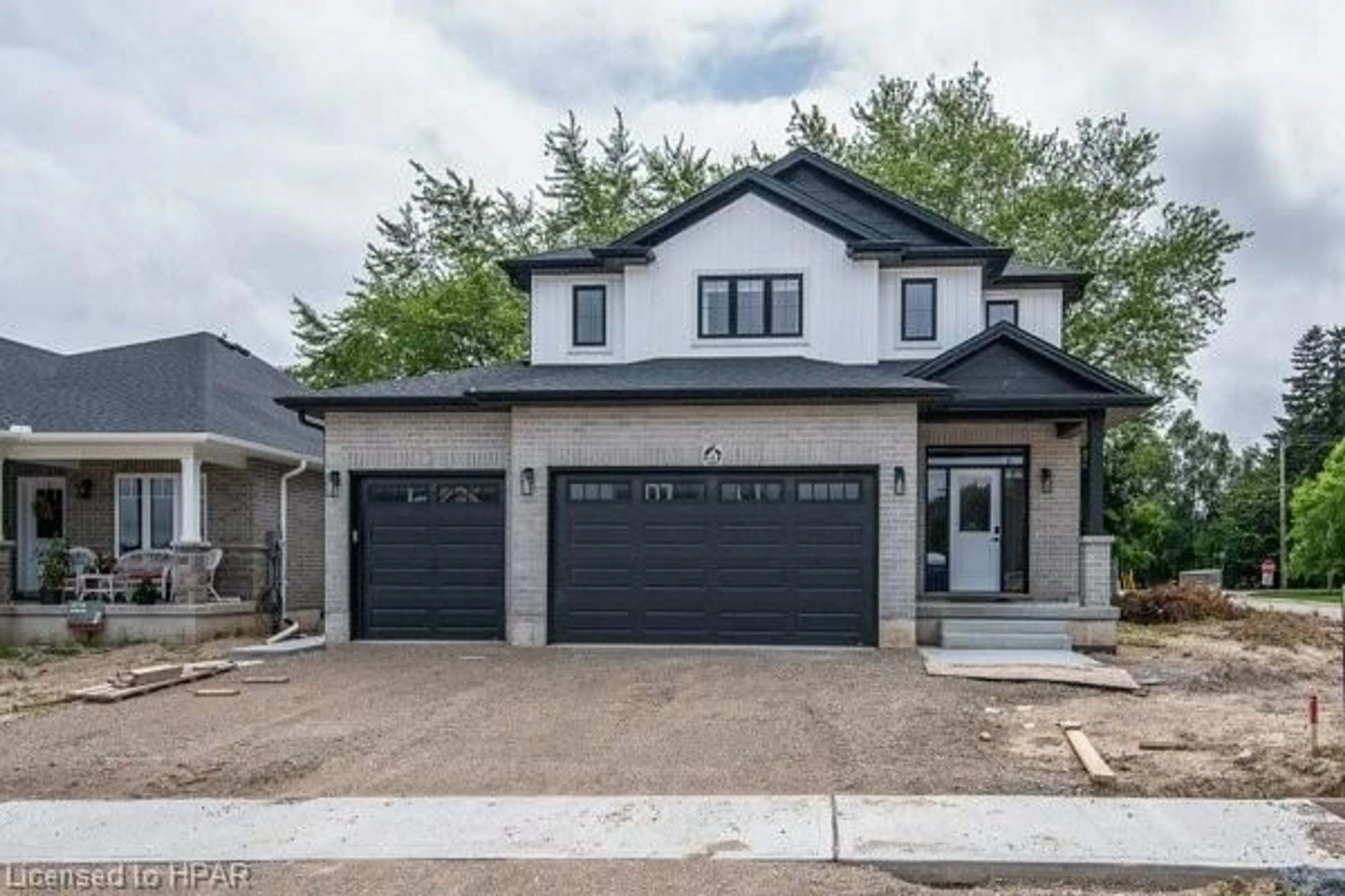 Frontside or backside of a home, the street view for 6 Diamond St, Tavistock Ontario N0B 2R0