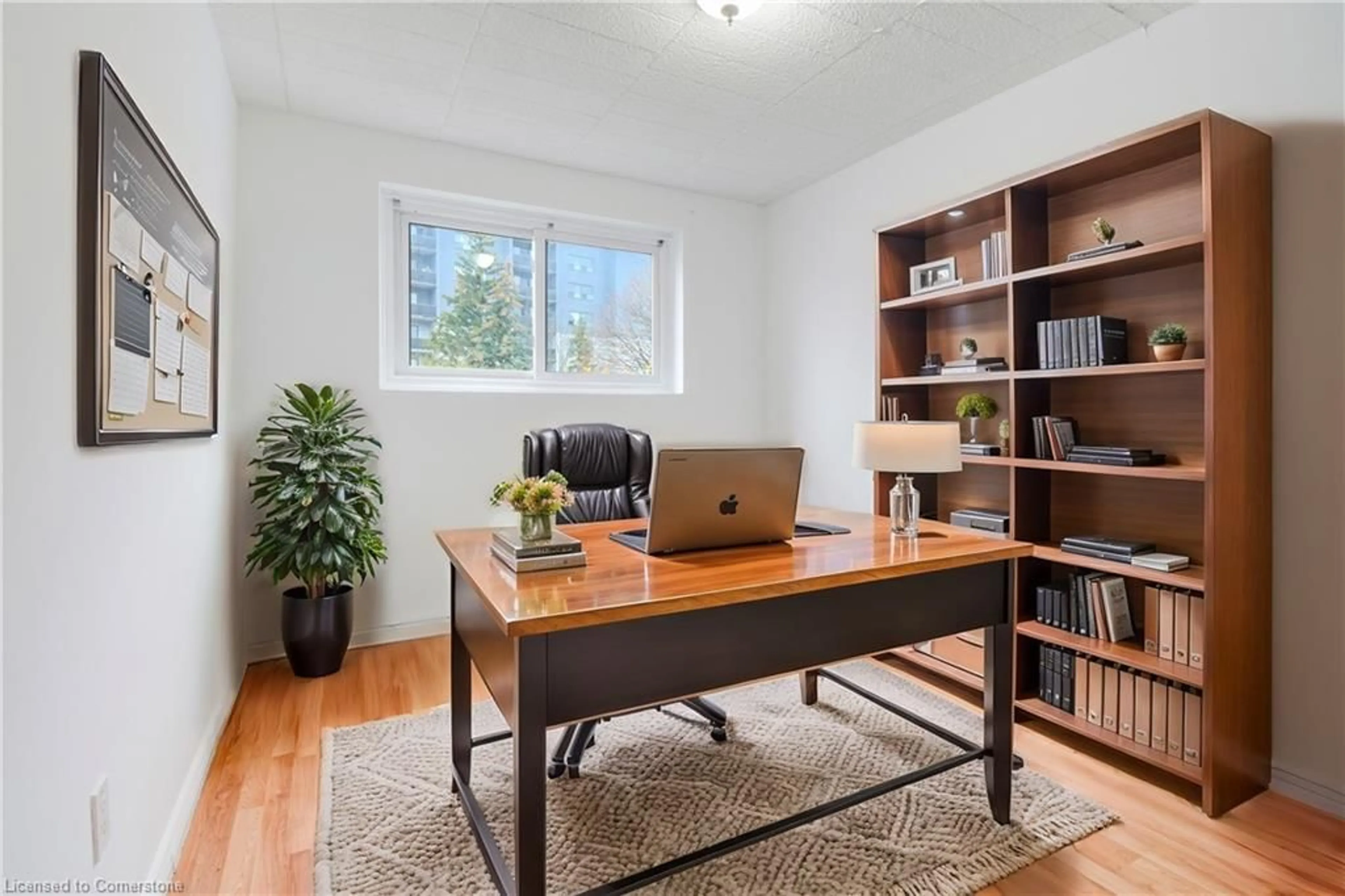 A pic of a room, wood floors for 71 Vanier Dr #309, Kitchener Ontario N2C 1J4