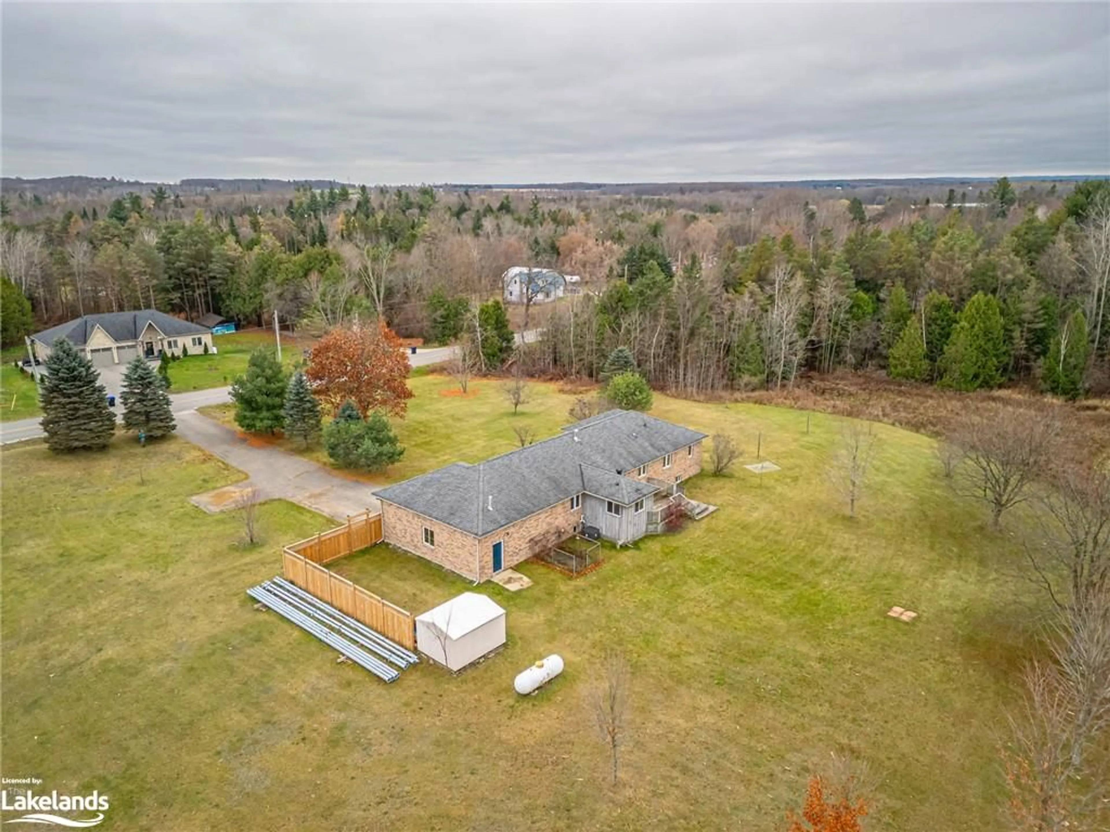 Frontside or backside of a home, the fenced backyard for 4228 Hogback Rd, Glencairn Ontario L0M 1K0